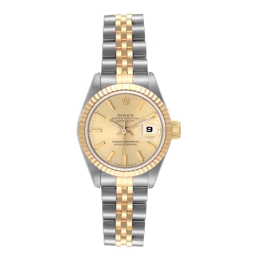 Rolex Datejust Steel Yellow Gold Champagne Dial Ladies Watch 69173 Papers. Officially certified chronometer automatic self-winding movement. Stainless steel oyster case 26.0 mm in diameter. Rolex logo on the crown. 18k yellow gold fluted bezel.