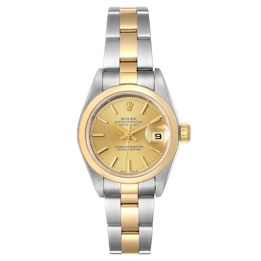 Rolex Datejust Steel Yellow Gold Champagne Dial Ladies Watch 79163. Officially certified chronometer self-winding movement. Stainless steel oyster case 26 mm in diameter. Rolex logo on a 18k yellow gold crown. 18k yellow gold smooth domed bezel.