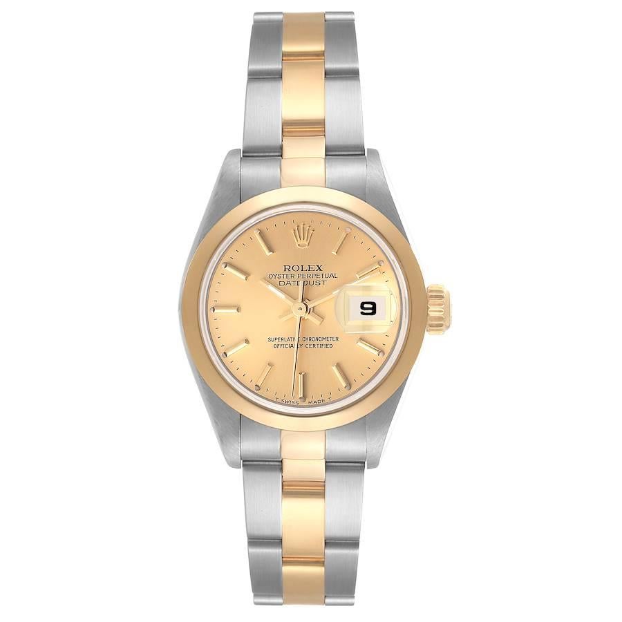 Rolex Datejust Steel Yellow Gold Champagne Dial Ladies Watch 79163. Officially certified chronometer self-winding movement. Stainless steel oyster case 26 mm in diameter. Rolex logo on a 18k yellow gold crown. 18k yellow gold smooth domed bezel.