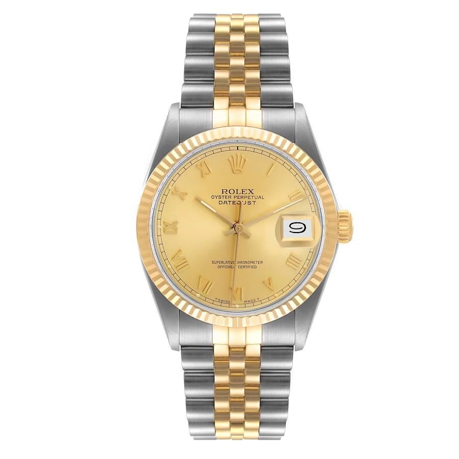 Rolex Datejust Steel Yellow Gold Champagne Dial Vintage Mens Watch 16013. Officially certified chronometer self-winding movement. Stainless steel oyster case 36.0 mm in diameter. Rolex logo on a crown. 18k yellow gold fluted bezel. Acrylic crystal