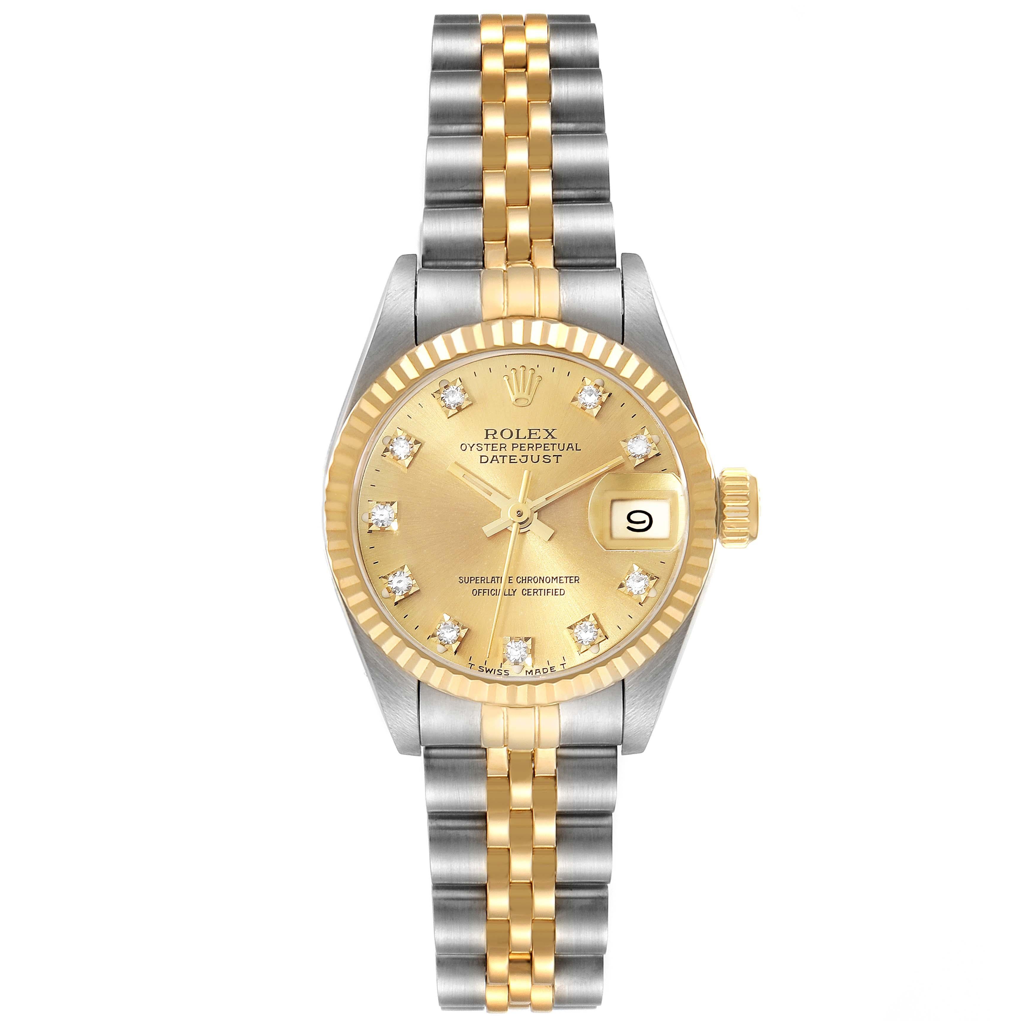 Rolex Datejust Steel Yellow Gold Champagne Diamond Dial Ladies Watch 69173. Officially certified chronometer automatic self-winding movement. Stainless steel oyster case 26.0 mm in diameter. Rolex logo on the crown. 18k yellow gold fluted bezel.