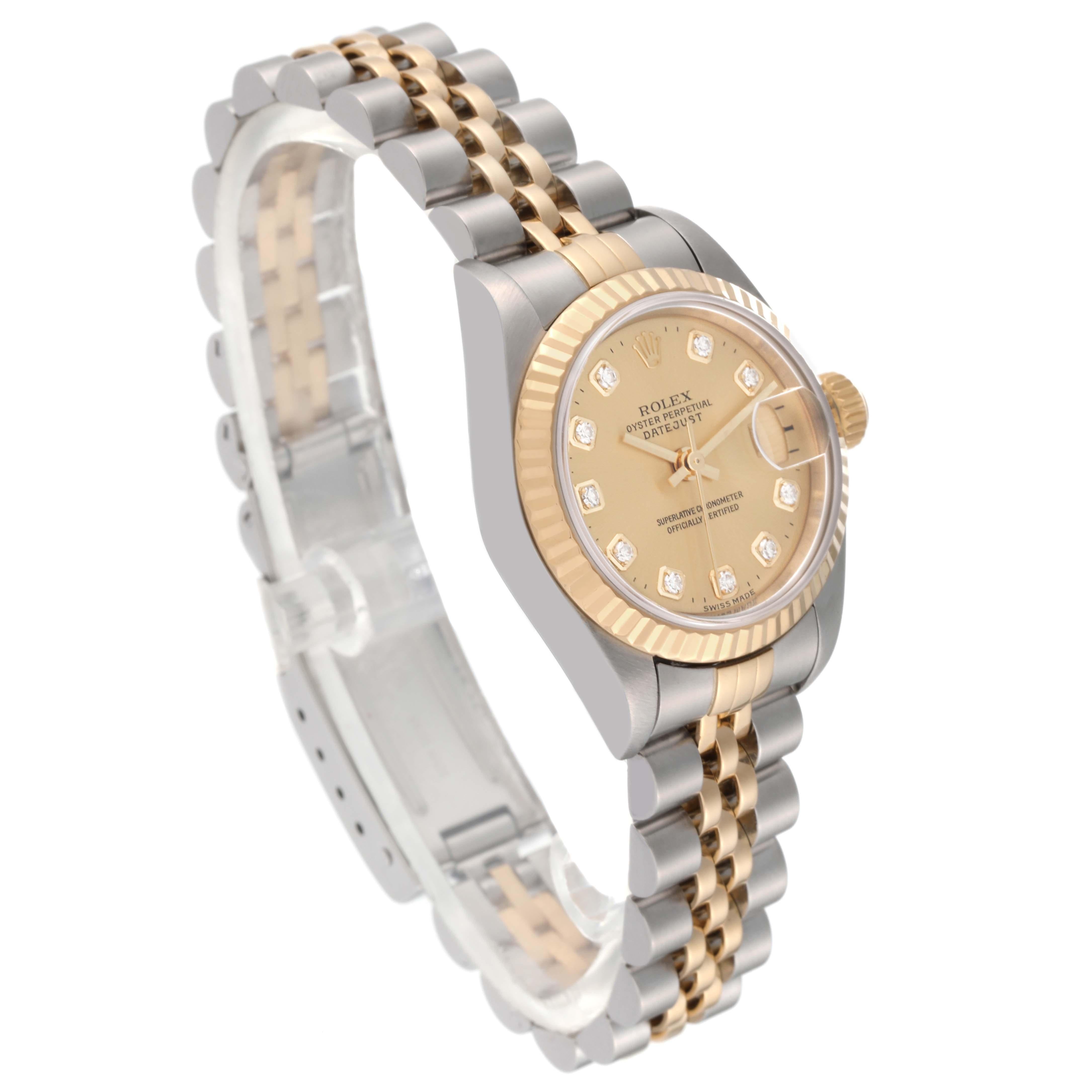 Rolex Datejust Steel Yellow Gold Champagne Diamond Dial Ladies Watch 79173. Officially certified chronometer automatic self-winding movement. Stainless steel oyster case 26.0 mm in diameter. Rolex logo on an 18K yellow gold crown. 18k yellow gold