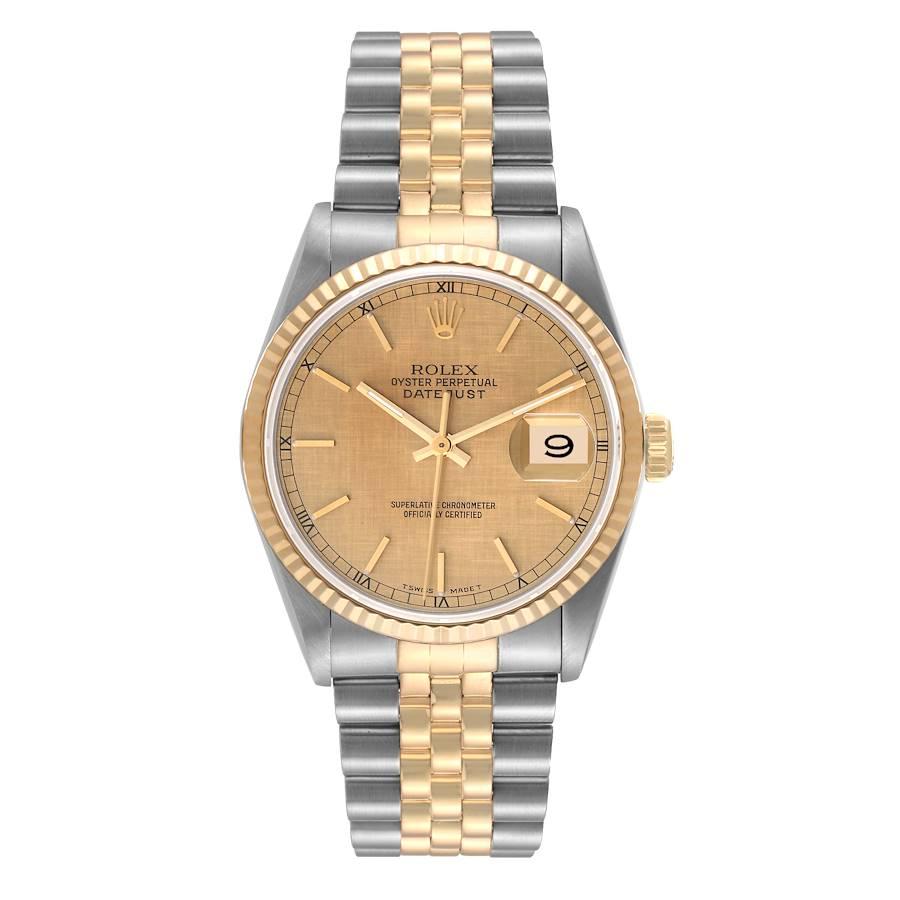 Rolex Datejust Steel Yellow Gold Champagne Linen Dial Mens Watch 16233. Officially certified chronometer automatic self-winding movement. Stainless steel case 36 mm in diameter.  Rolex logo on an 18K yellow gold crown. 18k yellow gold fluted bezel.
