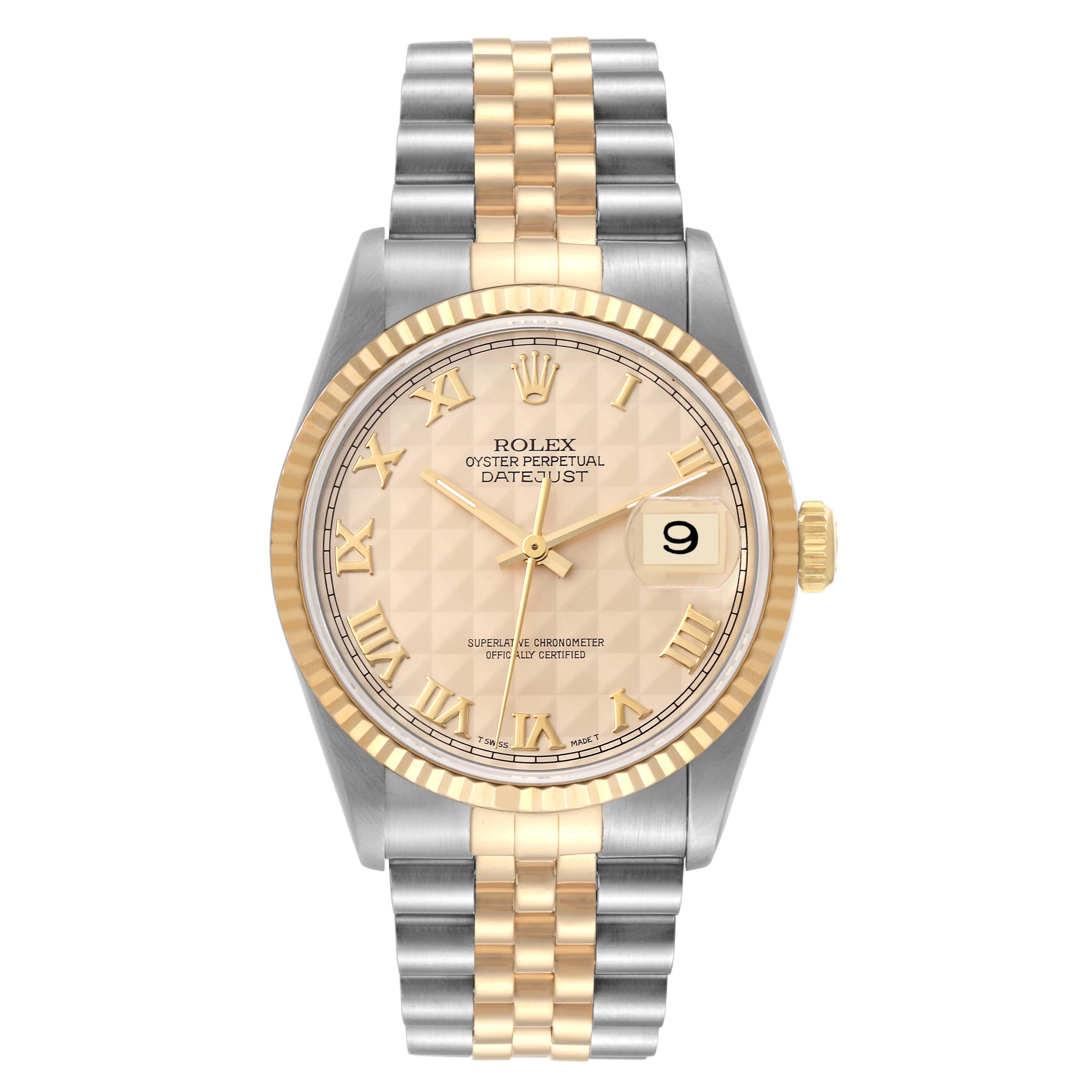 Rolex Datejust Steel Yellow Gold Champagne Pyramid Dial Mens Watch 16233. Officially certified chronometer automatic self-winding movement. Stainless steel case 36 mm in diameter.  Rolex logo on an 18K yellow gold crown. 18k yellow gold fluted