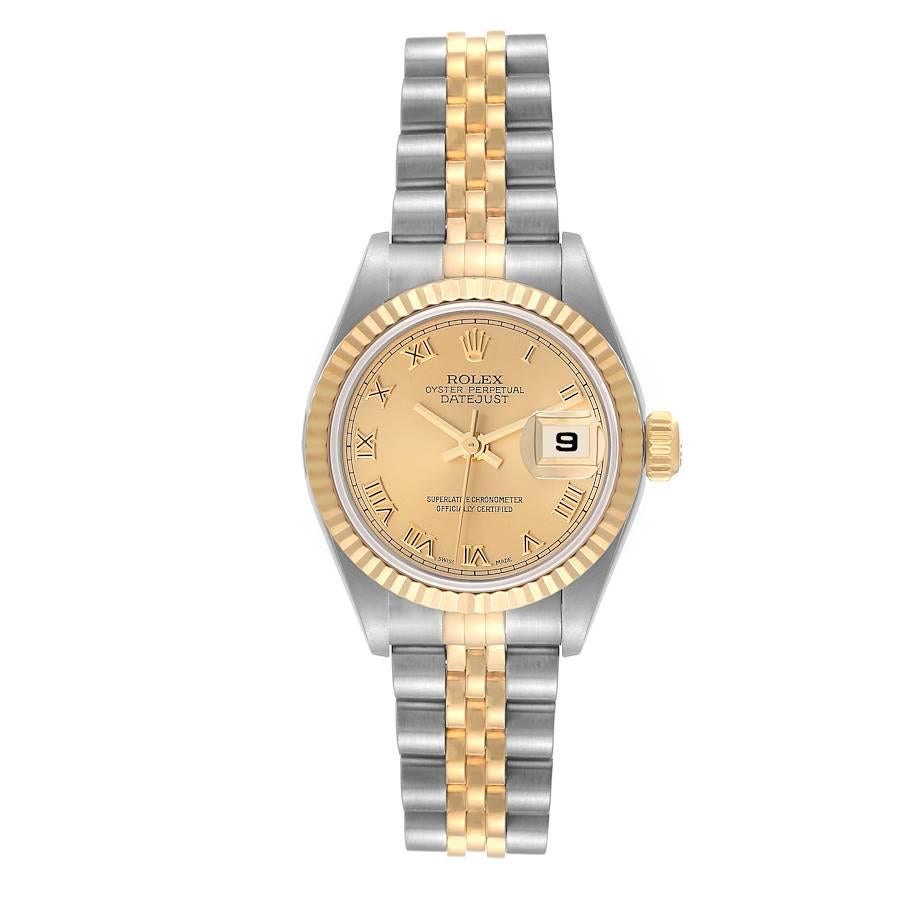 Rolex Datejust Steel Yellow Gold Champagne Roman Dial Ladies Watch 79173. Officially certified chronometer automatic self-winding movement. Stainless steel oyster case 26 mm in diameter. Rolex logo on an 18K yellow gold crown. 18k yellow gold fluted
