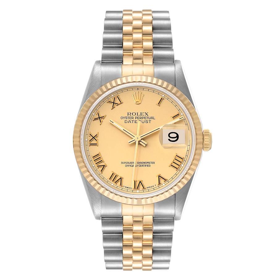 Rolex Datejust Steel Yellow Gold Champagne Roman Dial Mens Watch 16233. Officially certified chronometer automatic self-winding movement. Stainless steel case 36 mm in diameter.  Rolex logo on an 18K yellow gold crown. 18k yellow gold fluted bezel.