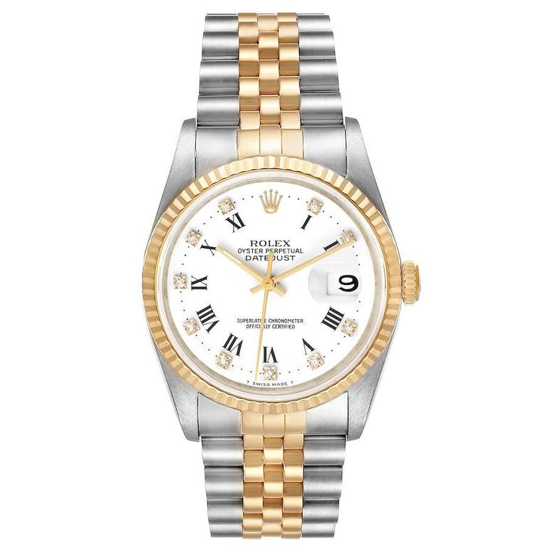Rolex Datejust Steel Yellow Gold Diamond Dial Mens Watch 16233. Officially certified chronometer self-winding movement. Stainless steel case 36 mm in diameter.  Rolex logo on a 18K yellow gold crown. 18k yellow gold fluted bezel. Scratch resistant