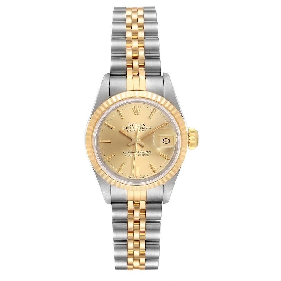 Rolex Datejust Steel Yellow Gold Fluted Bezel Ladies Watch 69173 Box. Officially certified chronometer self-winding movement. Stainless steel oyster case 26.0 mm in diameter. Rolex logo on a crown. 18k yellow gold fluted bezel. Scratch resistant