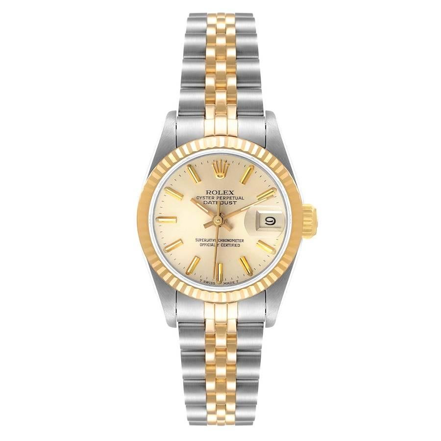 Rolex Datejust Steel Yellow Gold Fluted Bezel Ladies Watch 69173 Box Papers. Officially certified chronometer self-winding movement. Stainless steel oyster case 26.0 mm in diameter. Rolex logo on a crown. 18k yellow gold fluted bezel. Scratch