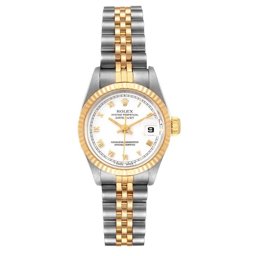 Rolex Datejust Steel Yellow Gold Fluted Bezel Ladies Watch 69173. Officially certified chronometer self-winding movement. Stainless steel oyster case 26 mm in diameter. Rolex logo on a crown. 18k yellow gold fluted bezel. Scratch resistant sapphire