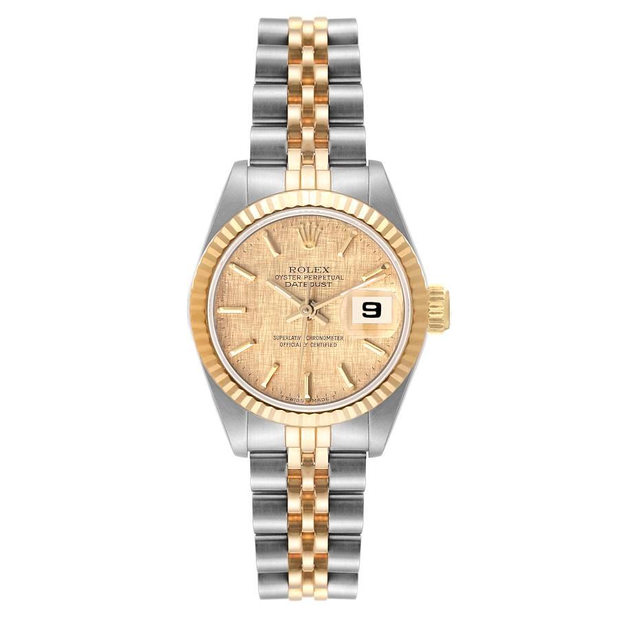 Rolex Datejust Steel Yellow Gold Fluted Bezel Linen Dial Ladies Watch 69173. Officially certified chronometer self-winding movement. Stainless steel oyster case 26.0 mm in diameter. Rolex logo on a crown. 18k yellow gold fluted bezel. Scratch