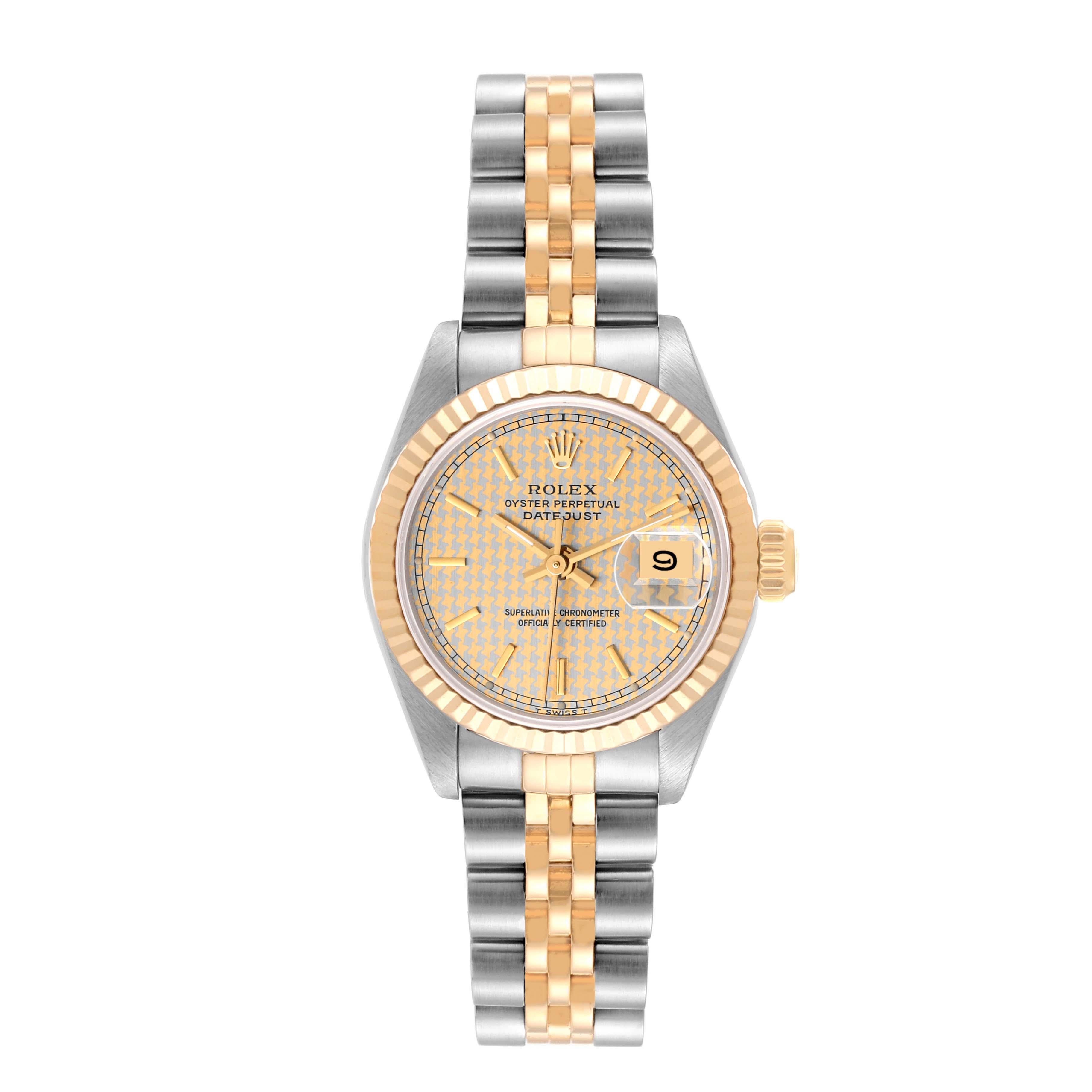 Rolex Datejust Steel Yellow Gold Houndstooth Dial Ladies Watch 69173. Officially certified chronometer automatic self-winding movement. Stainless steel oyster case 26.0 mm in diameter. Rolex logo on the crown. 18k yellow gold fluted bezel. Scratch