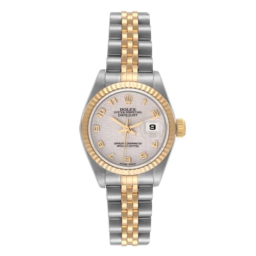 Rolex Datejust Steel Yellow Gold Ivory Anniversary Dial Ladies Watch 79173. Officially certified chronometer automatic self-winding movement. Stainless steel oyster case 26 mm in diameter. Rolex logo on an 18K yellow gold crown. 18k yellow gold