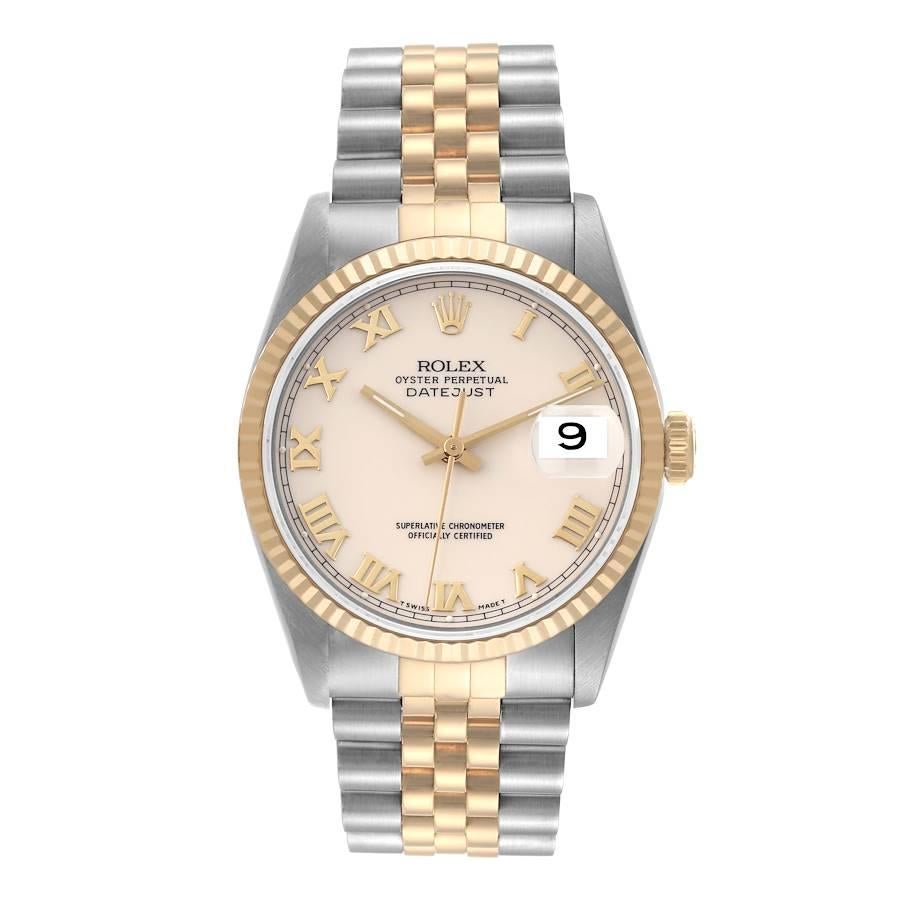 Rolex Datejust Steel Yellow Gold Ivory Dial Mens Watch 16233. Officially certified chronometer automatic self-winding movement. Stainless steel case 36 mm in diameter.  Rolex logo on an 18K yellow gold crown. 18k yellow gold fluted bezel. Scratch