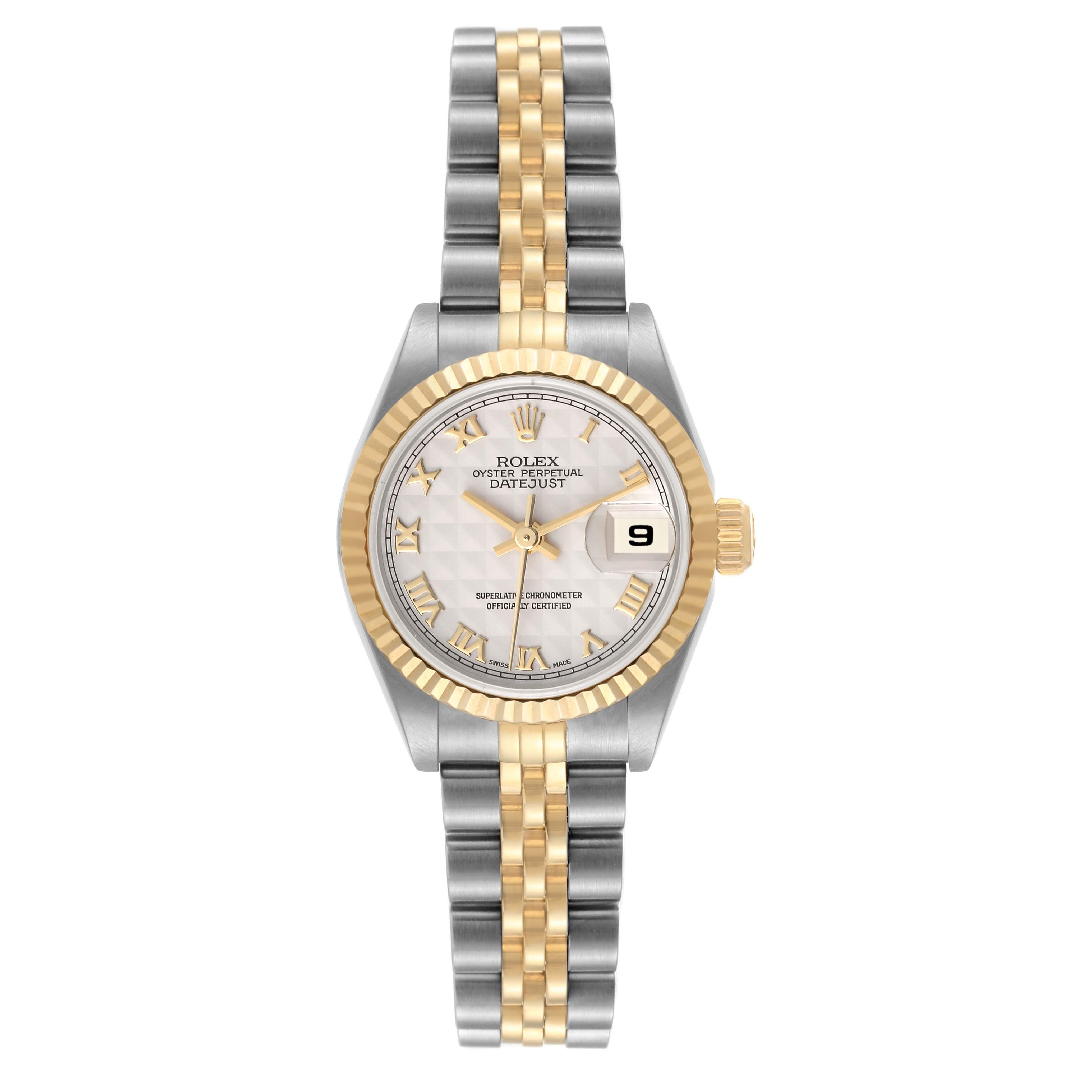 Rolex Datejust Steel Yellow Gold Ivory Pyramid Dial Ladies Watch 69173. Officially certified chronometer automatic self-winding movement. Stainless steel oyster case 26 mm in diameter. Rolex logo on the crown. 18k yellow gold fluted bezel. Scratch