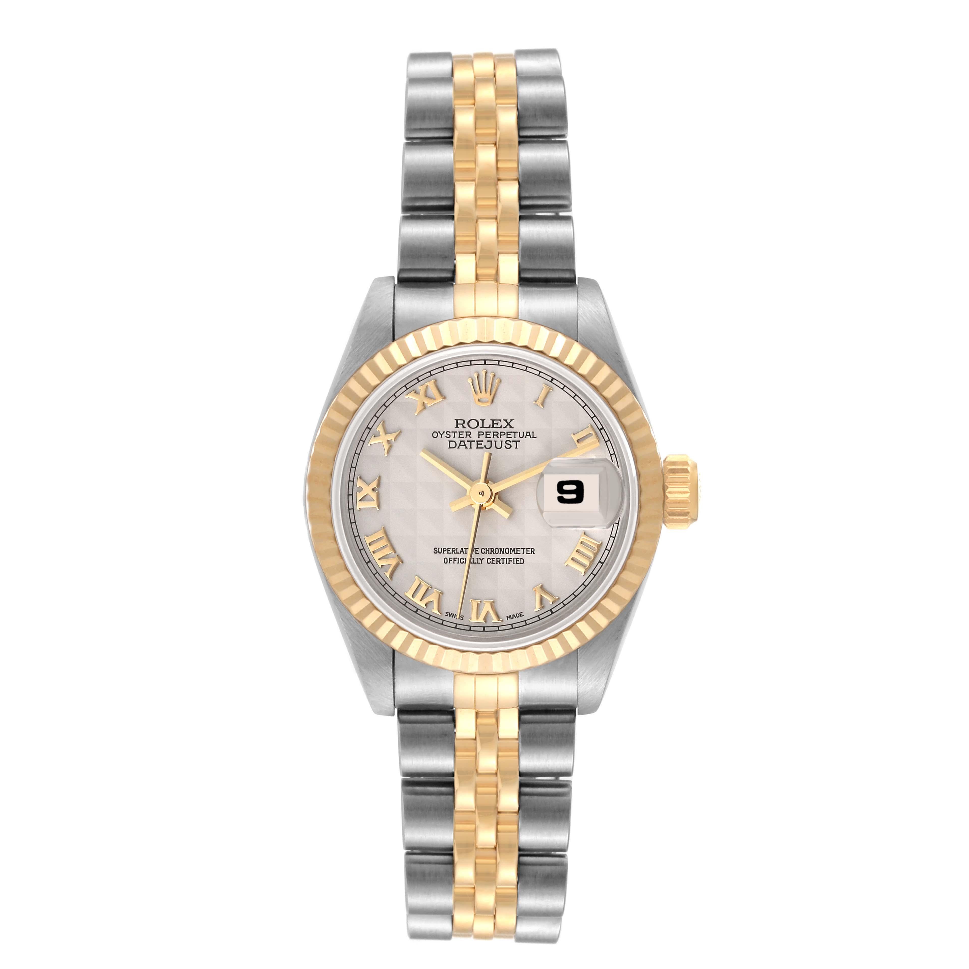Rolex Datejust Steel Yellow Gold Ivory Pyramid Dial Ladies Watch 69173. Officially certified chronometer automatic self-winding movement. Stainless steel oyster case 26 mm in diameter. Rolex logo on the crown. 18k yellow gold fluted bezel. Scratch