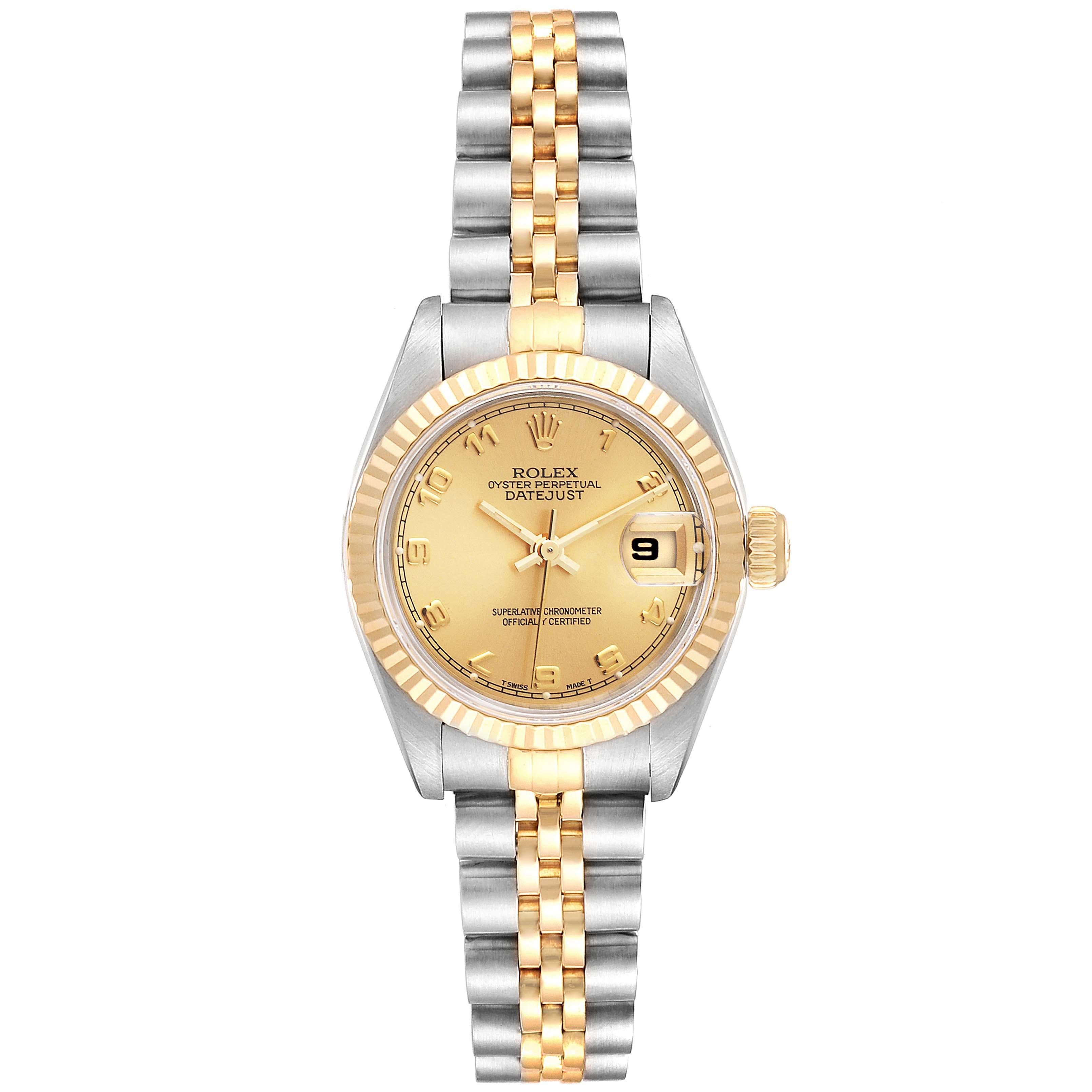 Rolex Datejust Steel Yellow Gold Ladies Watch 69173 Box Papers. Officially certified chronometer self-winding movement. Stainless steel oyster case 26.0 mm in diameter. Rolex logo on a crown. 18k yellow gold fluted bezel. Scratch resistant sapphire