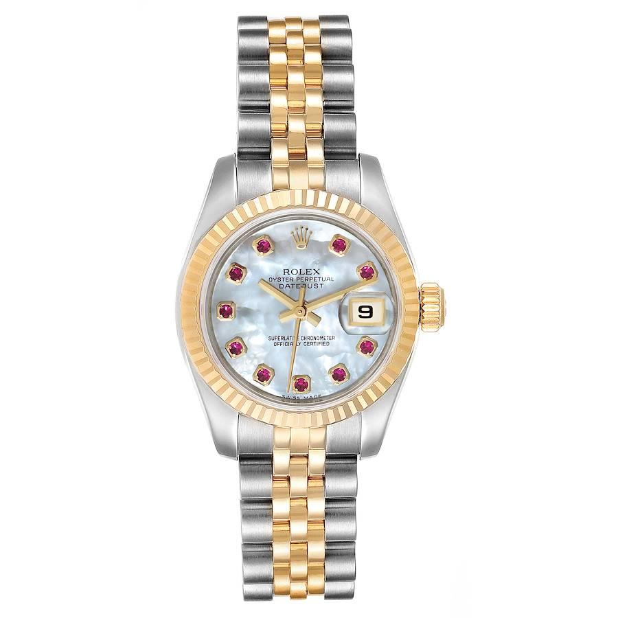 Rolex Datejust Steel Yellow Gold MOP Ruby Ladies Watch 179173. Officially certified chronometer self-winding movement. Stainless steel oyster case 26 mm in diameter. Rolex logo on a 18K yellow gold crown. 18k yellow gold fluted bezel. Scratch