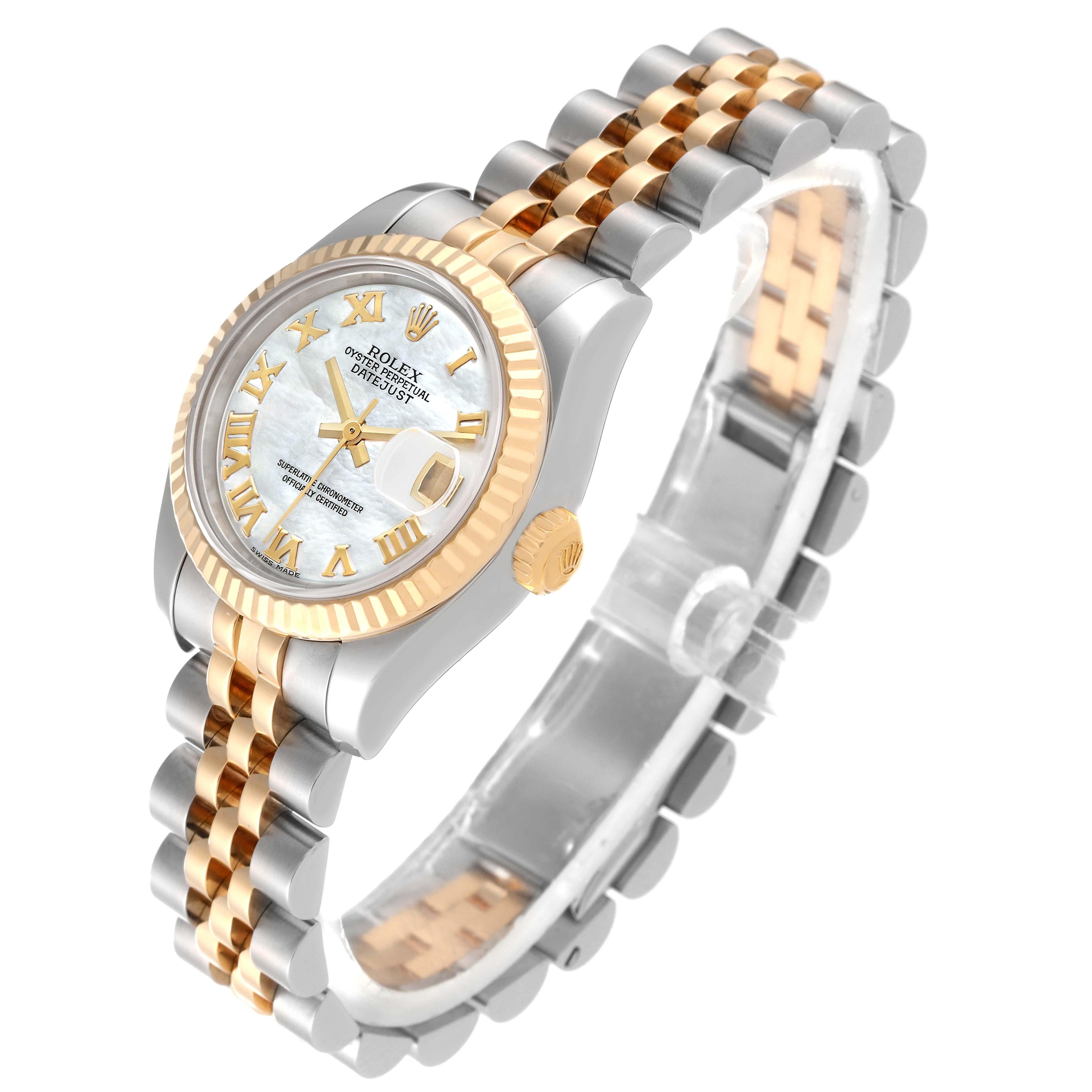 Rolex Datejust Steel Yellow Gold Mother Of Pearl Dial Ladies Watch 179173. Officially certified chronometer automatic self-winding movement. Stainless steel oyster case 26 mm in diameter. Rolex logo on a 18K yellow gold crown. 18k yellow gold fluted