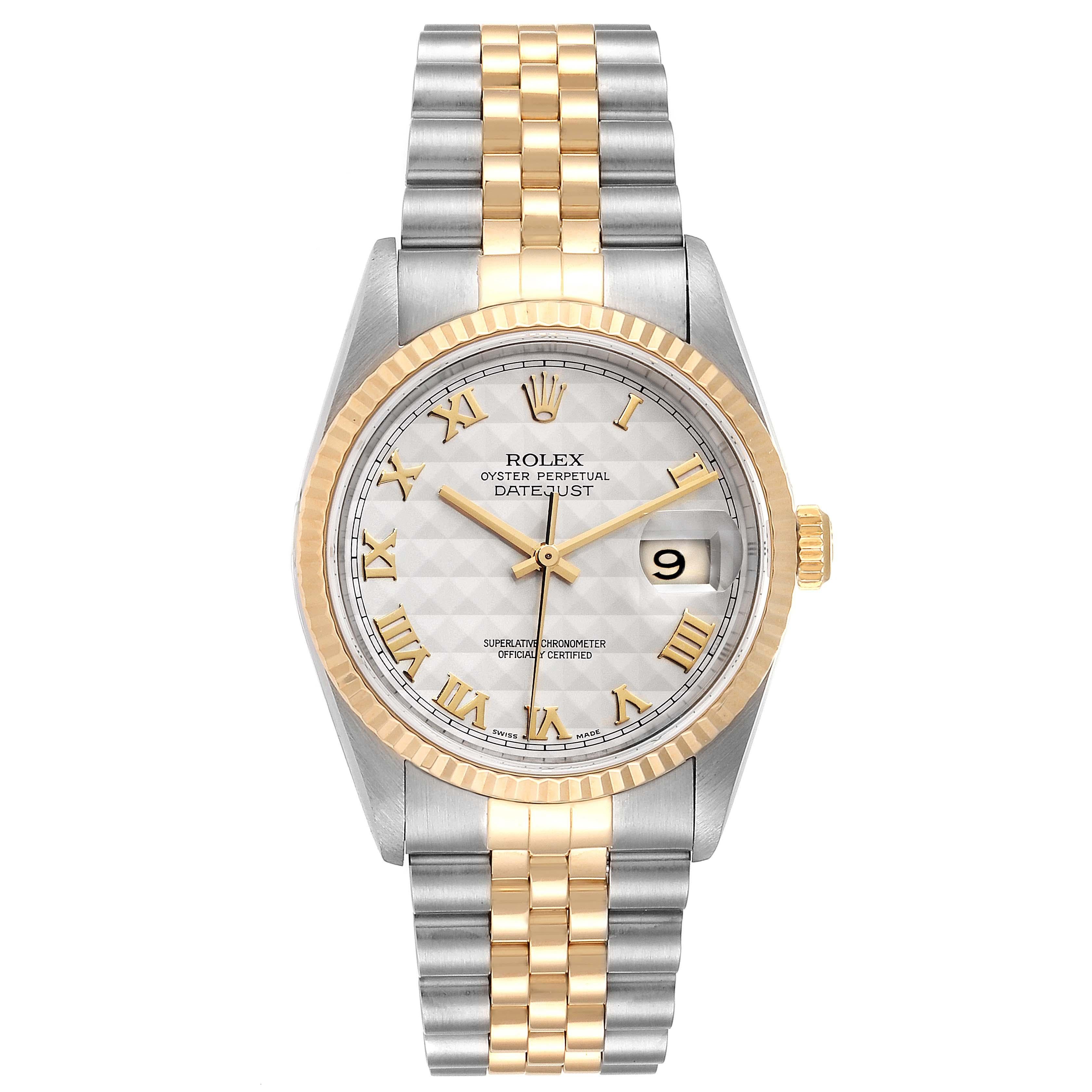 Rolex Datejust Steel Yellow Gold Pyramid Roman Dial Mens Watch 16233. Officially certified chronometer self-winding movement. Stainless steel case 36 mm in diameter. Rolex logo on a 18K yellow gold crown. 18k yellow gold fluted bezel. Scratch