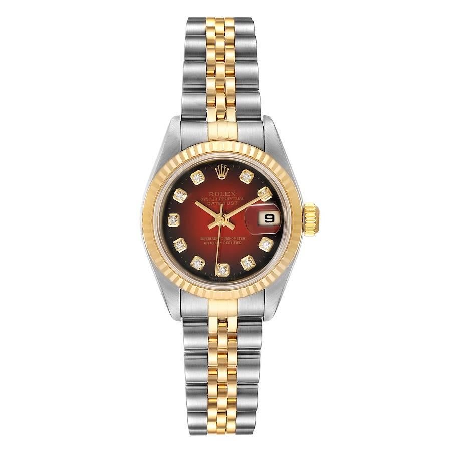 Rolex Datejust Steel Yellow Gold Red Vignette Diamond Ladies Watch 79173. Officially certified chronometer self-winding movement with quickset date function. Stainless steel oyster case 26 mm in diameter. Rolex logo on a 18K yellow gold crown. 18k