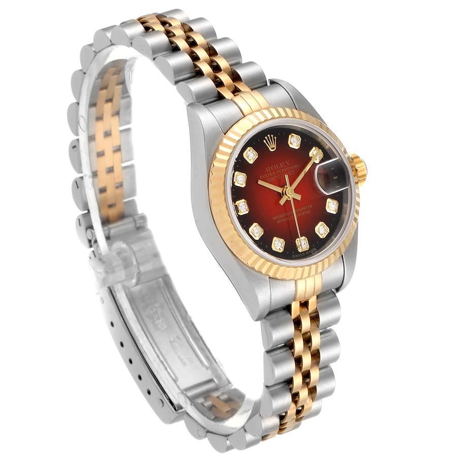 gold watch red face