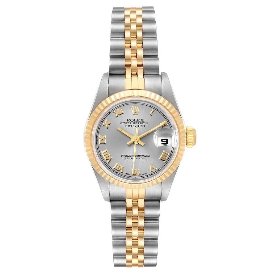 Rolex Datejust Steel Yellow Gold Silver Dial Ladies Watch 69173 Box. Officially certified chronometer self-winding movement. Stainless steel oyster case 26 mm in diameter. Rolex logo on a crown. 18k yellow gold fluted bezel. Scratch resistant