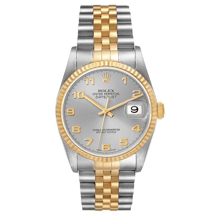 Rolex Datejust Steel Yellow Gold Silver Dial Mens Watch 16233. Officially certified chronometer self-winding movement. Stainless steel case 36 mm in diameter.  Rolex logo on an 18K yellow gold crown. 18k yellow gold fluted bezel. Scratch resistant