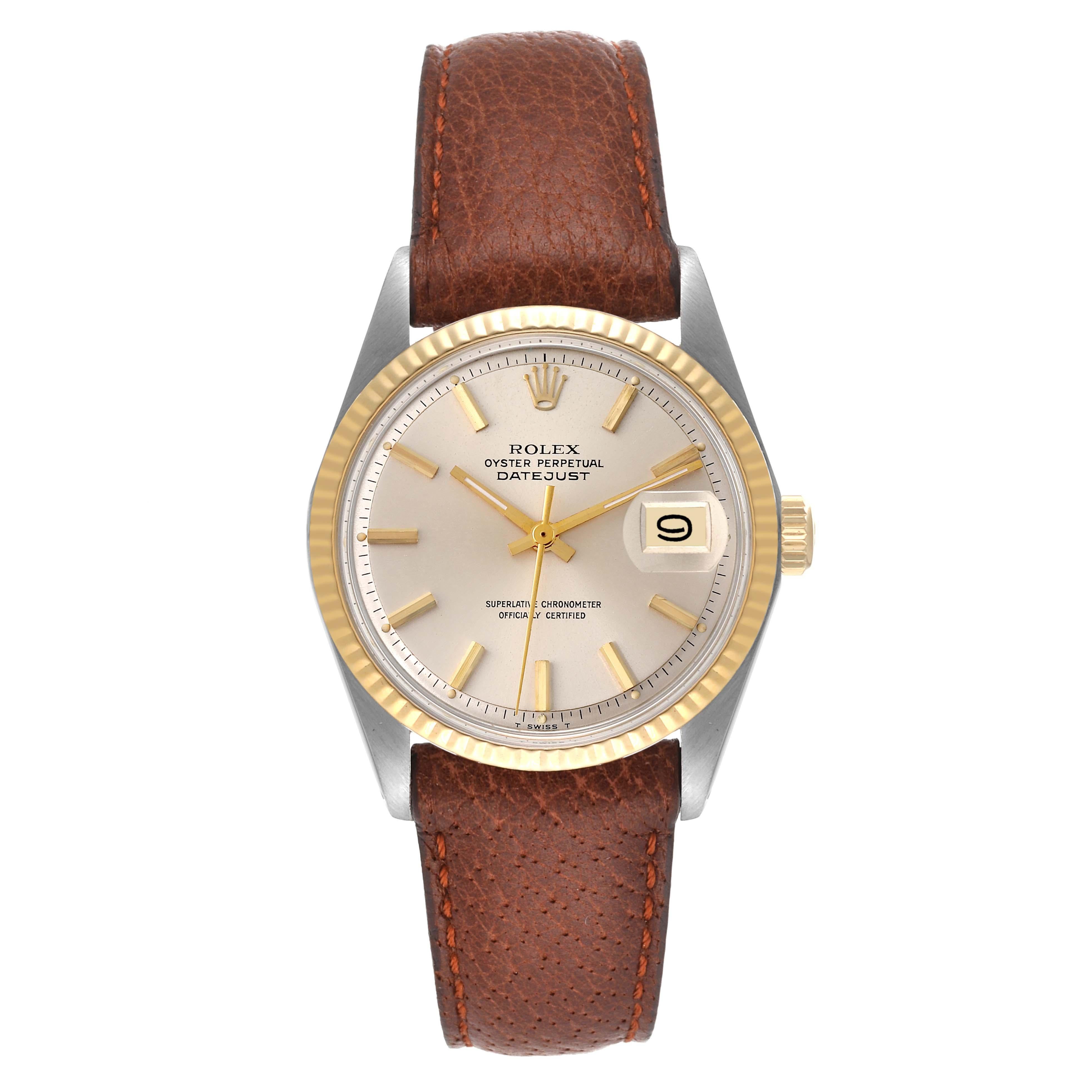 Rolex Datejust Steel Yellow Gold Silver Dial Vintage Mens Watch 1601. Officially certified chronometer automatic self-winding movement. Stainless steel case 36 mm in diameter. Rolex logo on an 18k yellow gold crown. 18k yellow gold fluted bezel.