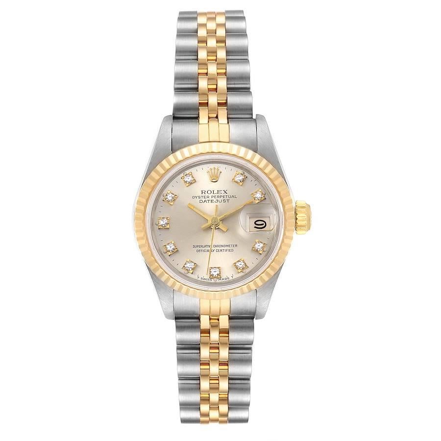 Rolex Datejust Steel Yellow Gold Silver Diamond Dial Ladies Watch 69173. Officially certified chronometer self-winding movement. Stainless steel oyster case 26.0 mm in diameter. Rolex logo on a crown. 18k yellow gold fluted bezel. Scratch resistant