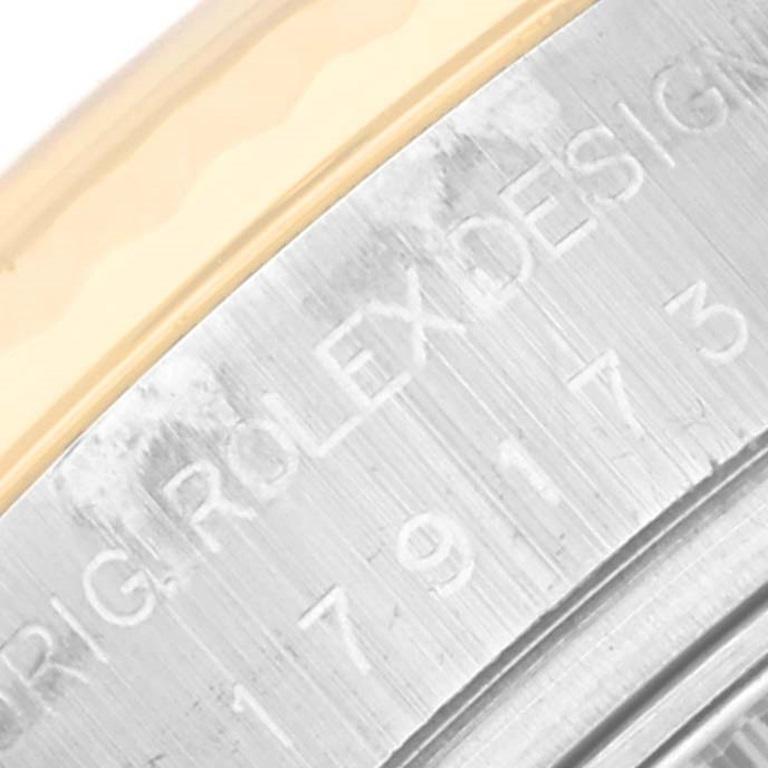 Rolex Datejust Stahl Gelb Gold Schiefer Zifferblatt Damenuhr 179173 Box-Karte. Offiziell zertifiziertes Chronometerwerk mit automatischem Aufzug. Austerngehäuse aus Edelstahl mit einem Durchmesser von 26 mm. Rolex-Logo auf einer Krone aus 18 Karat