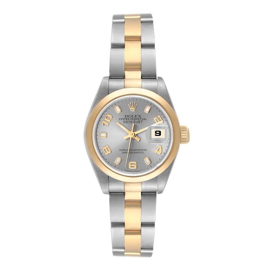 Rolex Datejust Steel Yellow Gold Slate Dial Ladies Watch 69163 Box Papers. Officially certified chronometer automatic self-winding movement. Stainless steel oyster case 26.0 mm in diameter. Rolex logo on the crown. 18k yellow gold smooth bezel.