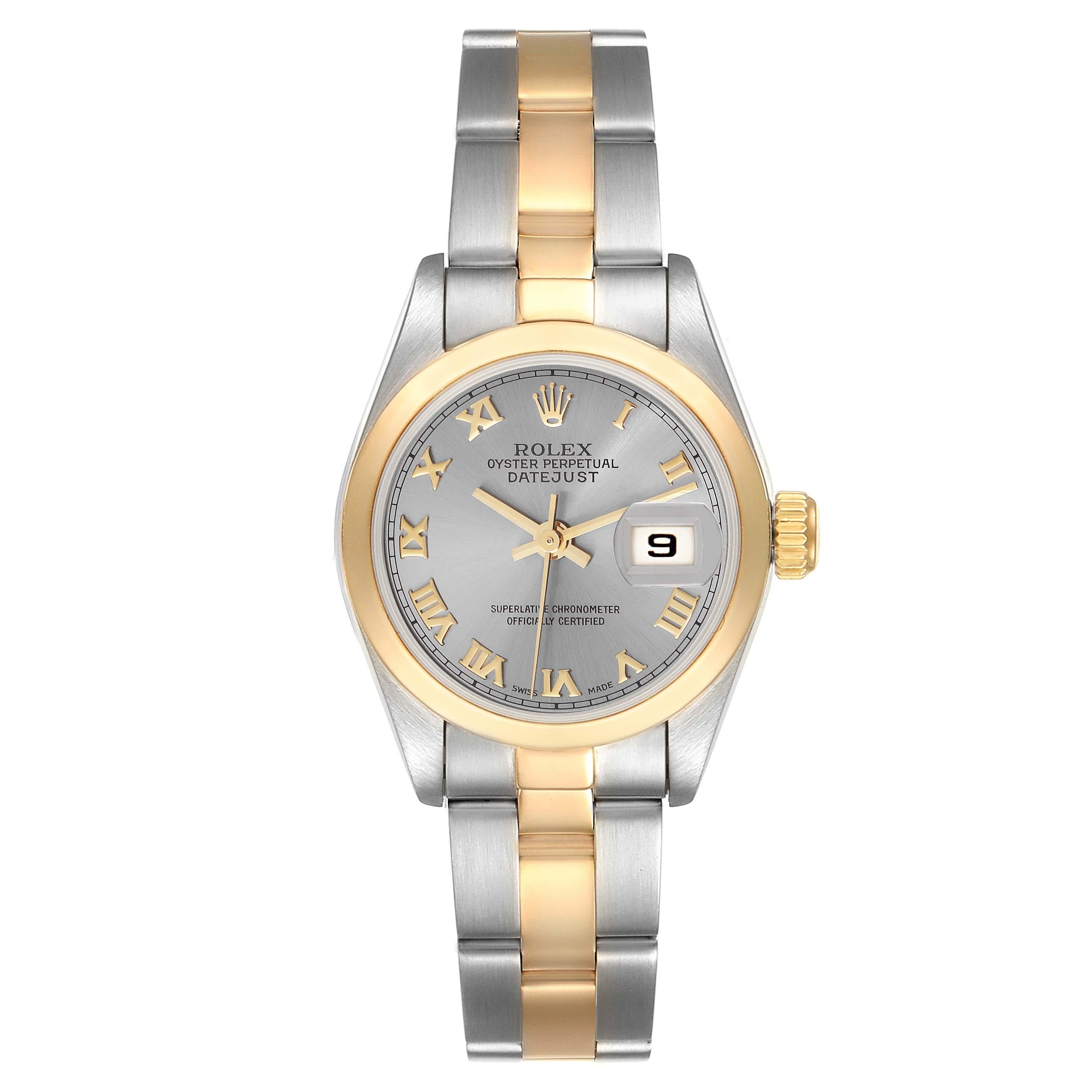 Rolex Datejust Steel Yellow Gold Slate Dial Ladies Watch 69163 Box Papers. Officially certified chronometer automatic self-winding movement. Stainless steel oyster case 26.0 mm in diameter. Rolex logo on the crown. 18k yellow gold smooth bezel.