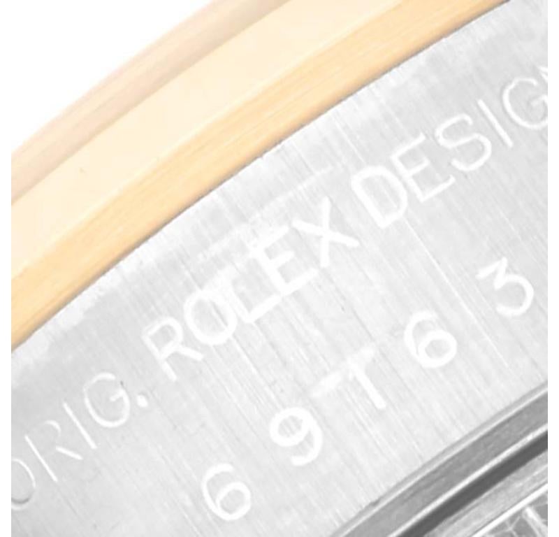 Rolex Datejust Stahl Gelbgold Schiefer Zifferblatt Damenuhr 69163. Offiziell zertifiziertes Chronometerwerk mit automatischem Aufzug. Austerngehäuse aus Edelstahl mit einem Durchmesser von 26.0 mm. Rolex Logo auf der Krone. 18k Gelbgold glatte