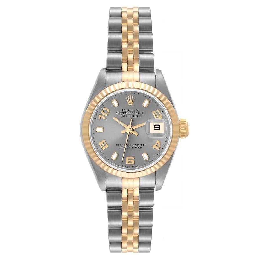 Rolex Datejust Steel Yellow Gold Slate Dial Ladies Watch 79173 Box Papers. Officially certified chronometer self-winding movement. Stainless steel oyster case 26 mm in diameter. Rolex logo on an 18K yellow gold crown. 18k yellow gold fluted bezel.