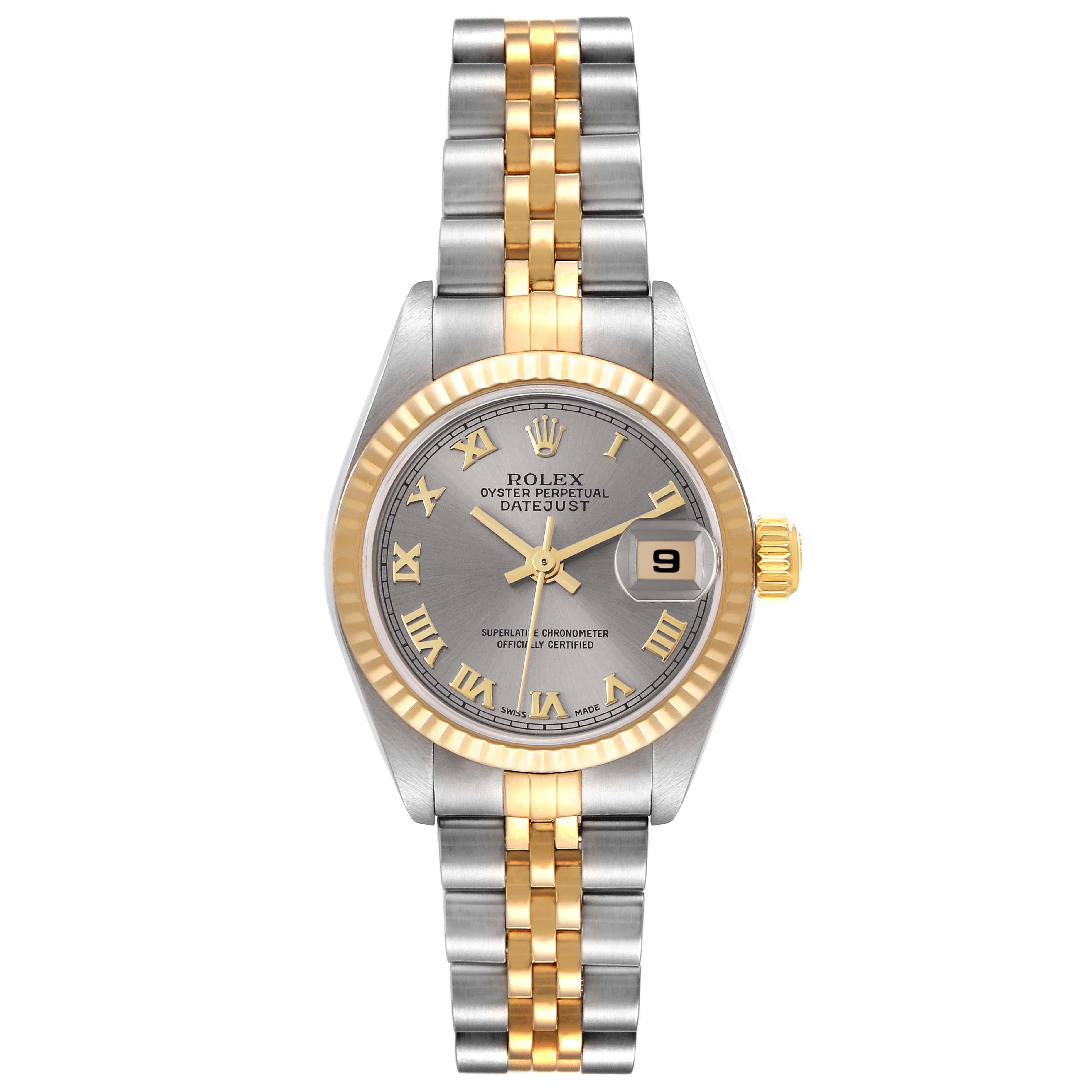 Rolex Datejust Steel Yellow Gold Slate Dial Ladies Watch 79173. Officially certified chronometer self-winding movement. Stainless steel oyster case 26.0 mm in diameter. Rolex logo on a 18K yellow gold crown. 18k yellow gold fluted bezel. Scratch