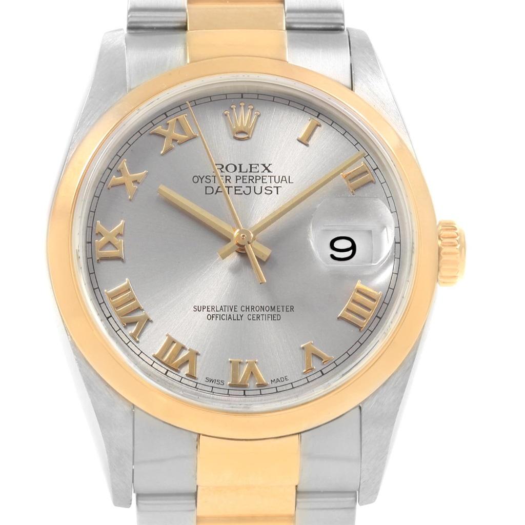 Rolex Datejust Steel Yellow Gold Slate Dial Mens Watch 16203 Box Papers. Officially certified chronometer automatic self-winding movement. Stainless steel case 36 mm in diameter. Rolex logo on a 18K yellow gold crown. 18k yellow gold smooth domed