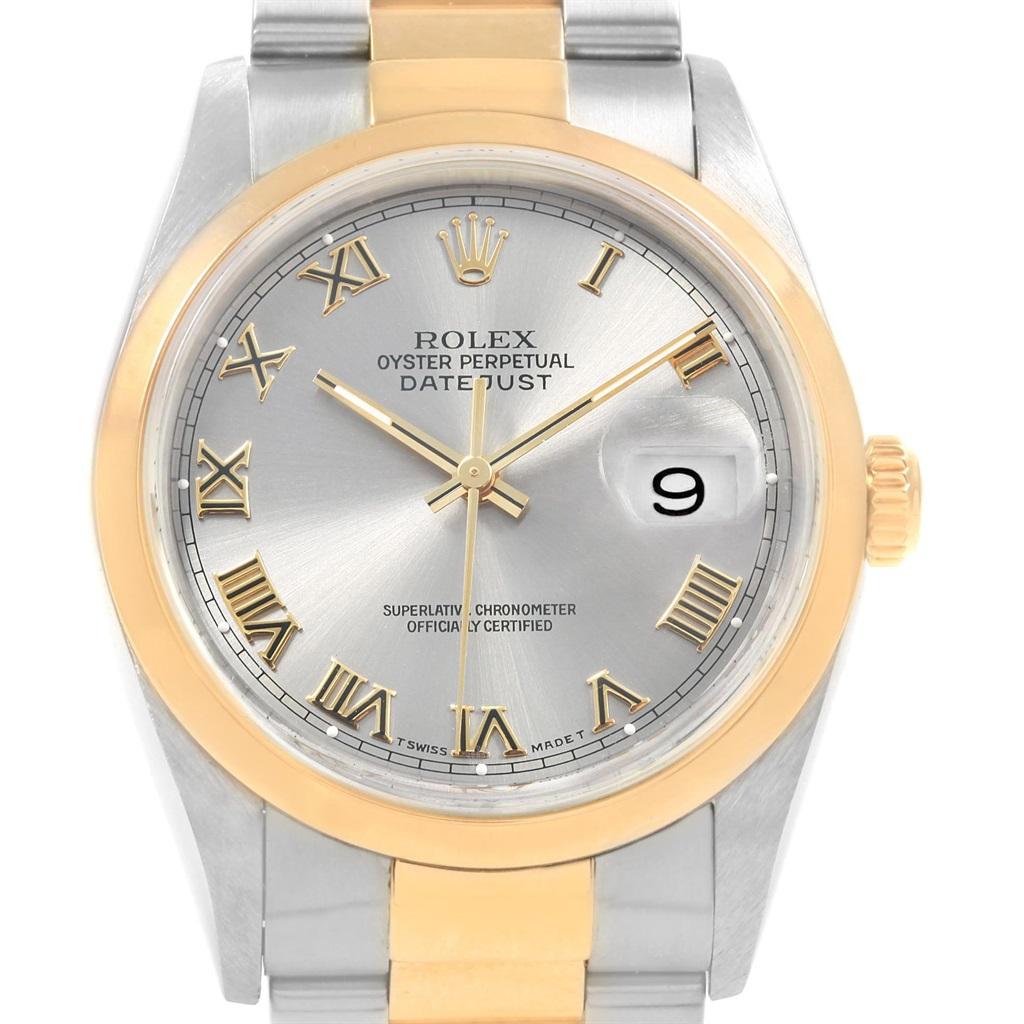 Rolex Datejust Steel Yellow Gold Slate Dial Mens Watch 16203 Box Papers. Officially certified chronometer self-winding movement. Stainless steel case 36 mm in diameter. Rolex logo on a 18K yellow gold crown. 18k yellow gold smooth domed bezel.