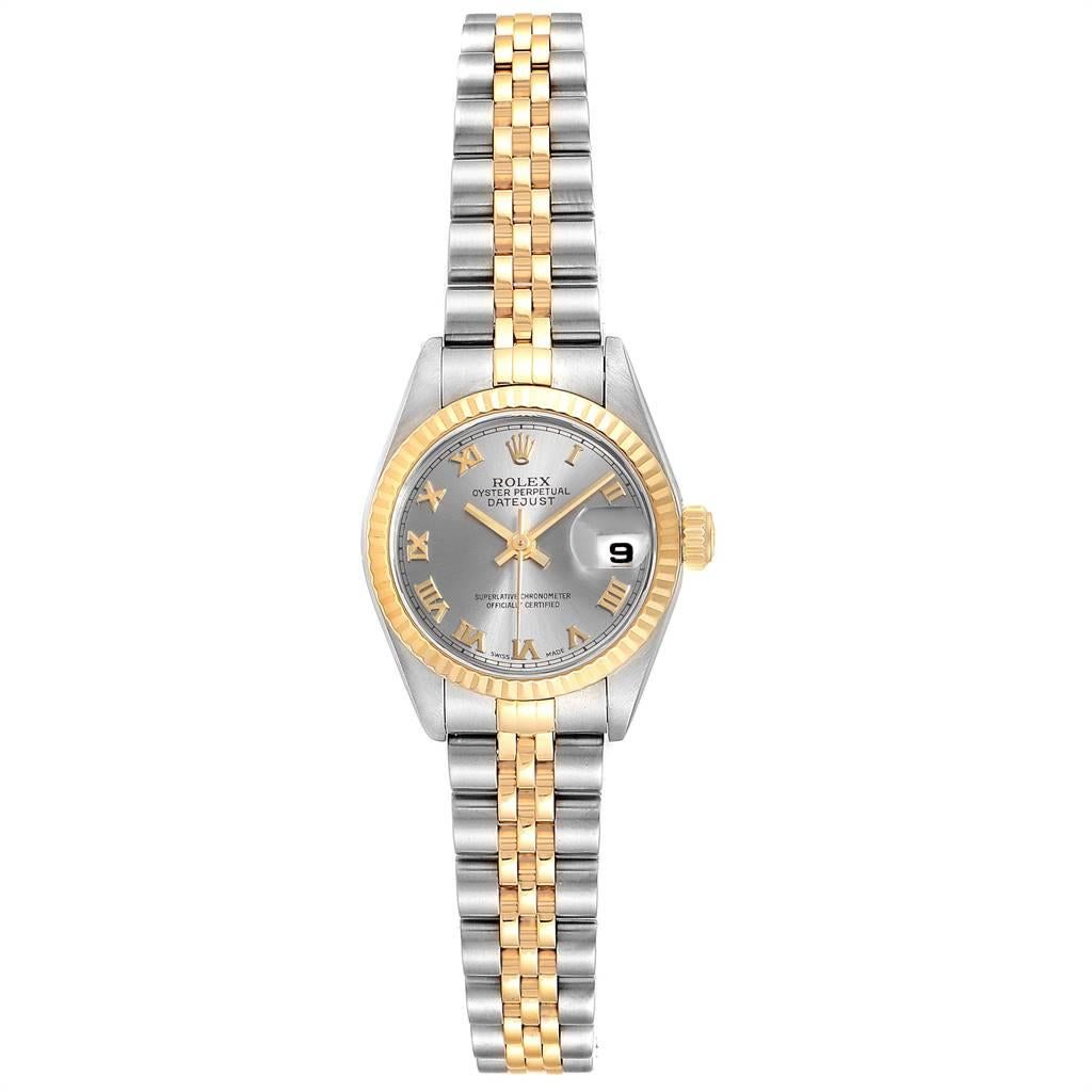Rolex Datejust Steel Yellow Gold Slate Roman Dial Ladies Watch 79173. Officially certified chronometer self-winding movement. Stainless steel oyster case 26.0 mm in diameter. Rolex logo on a 18K yellow gold crown. 18k yellow gold fluted bezel.