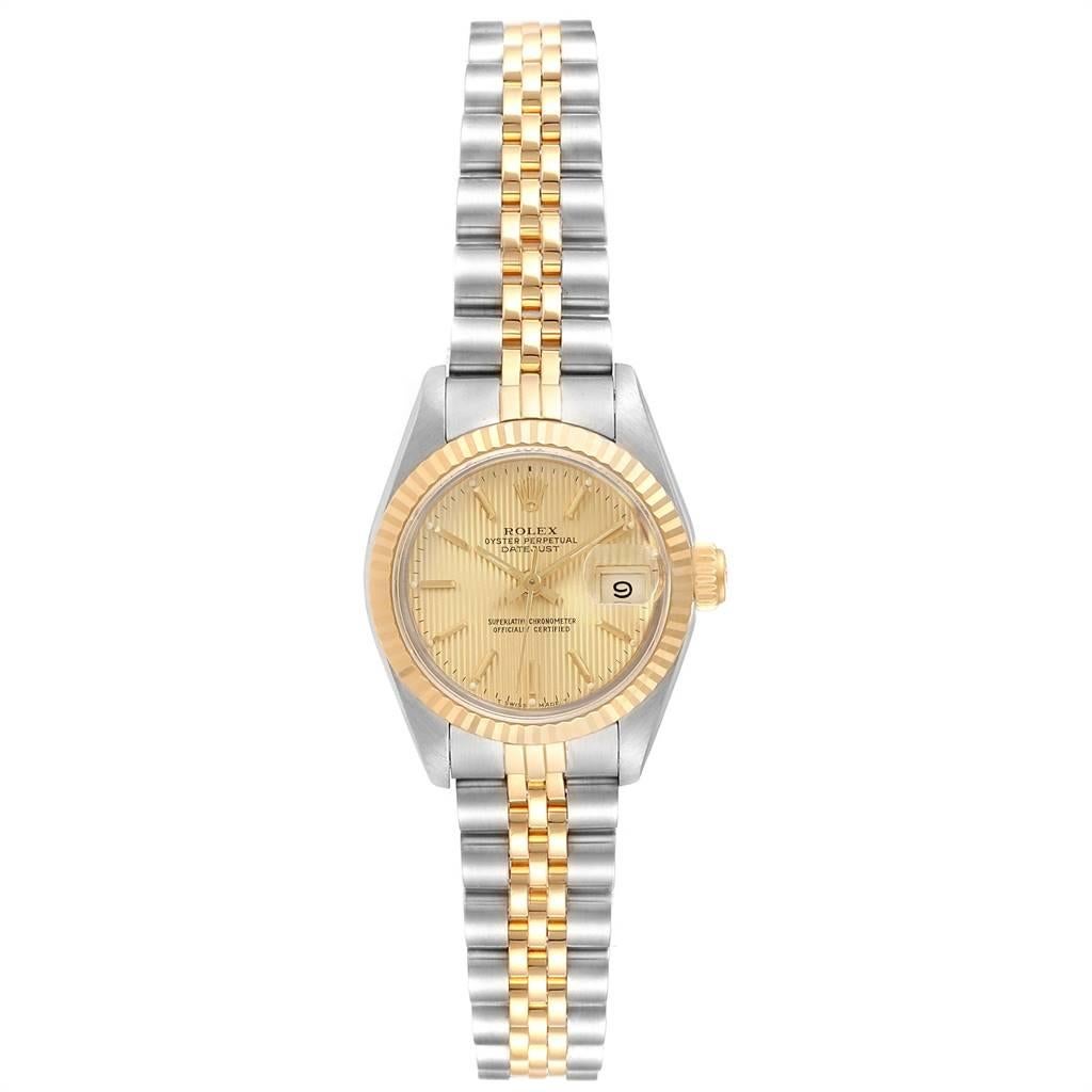 Rolex Datejust Steel Yellow Gold Tapestry Dial Ladies Watch 69173 Box Papers. Officially certified chronometer self-winding movement. Stainless steel oyster case 26.0 mm in diameter. Rolex logo on a crown. 18k yellow gold fluted bezel. Scratch