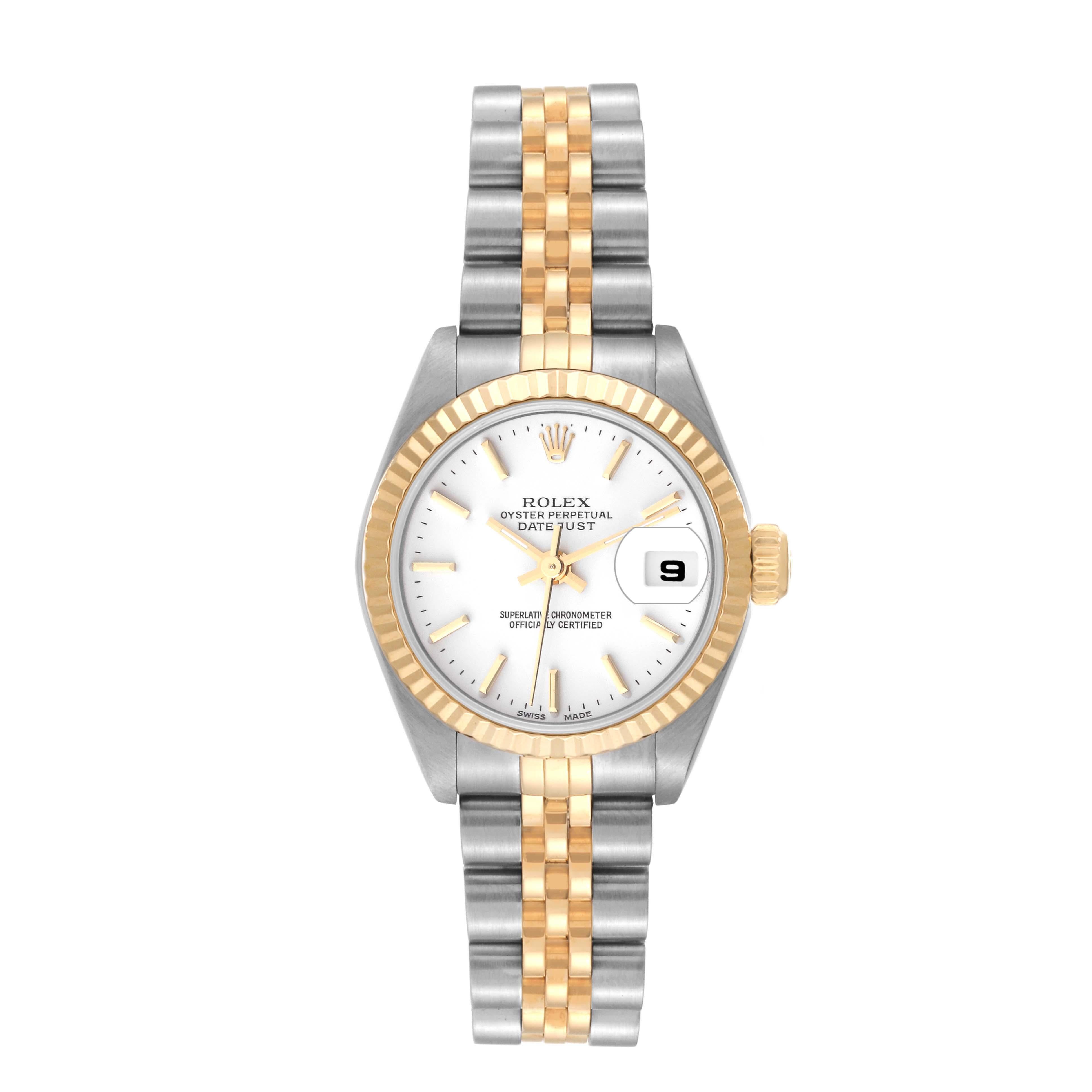 Rolex Datejust Steel Yellow Gold White Dial Ladies Watch 79173. Officially certified chronometer automatic self-winding movement. Stainless steel oyster case 26.0 mm in diameter. Rolex logo on an 18K yellow gold crown. 18k yellow gold fluted bezel.
