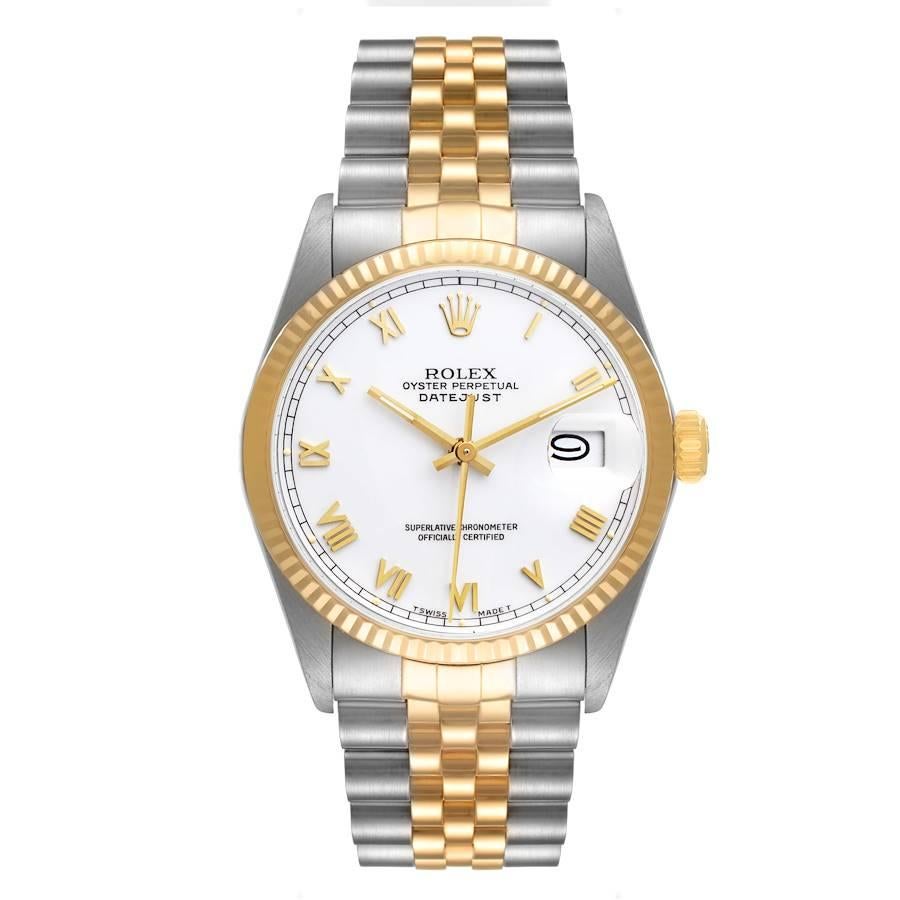 Rolex Datejust Steel Yellow Gold White Dial Vintage Mens Watch 16013. Officially certified chronometer self-winding movement. Stainless steel oyster case 36.0 mm in diameter. Rolex logo on a crown. 18k yellow gold fluted bezel. Acrylic crystal with