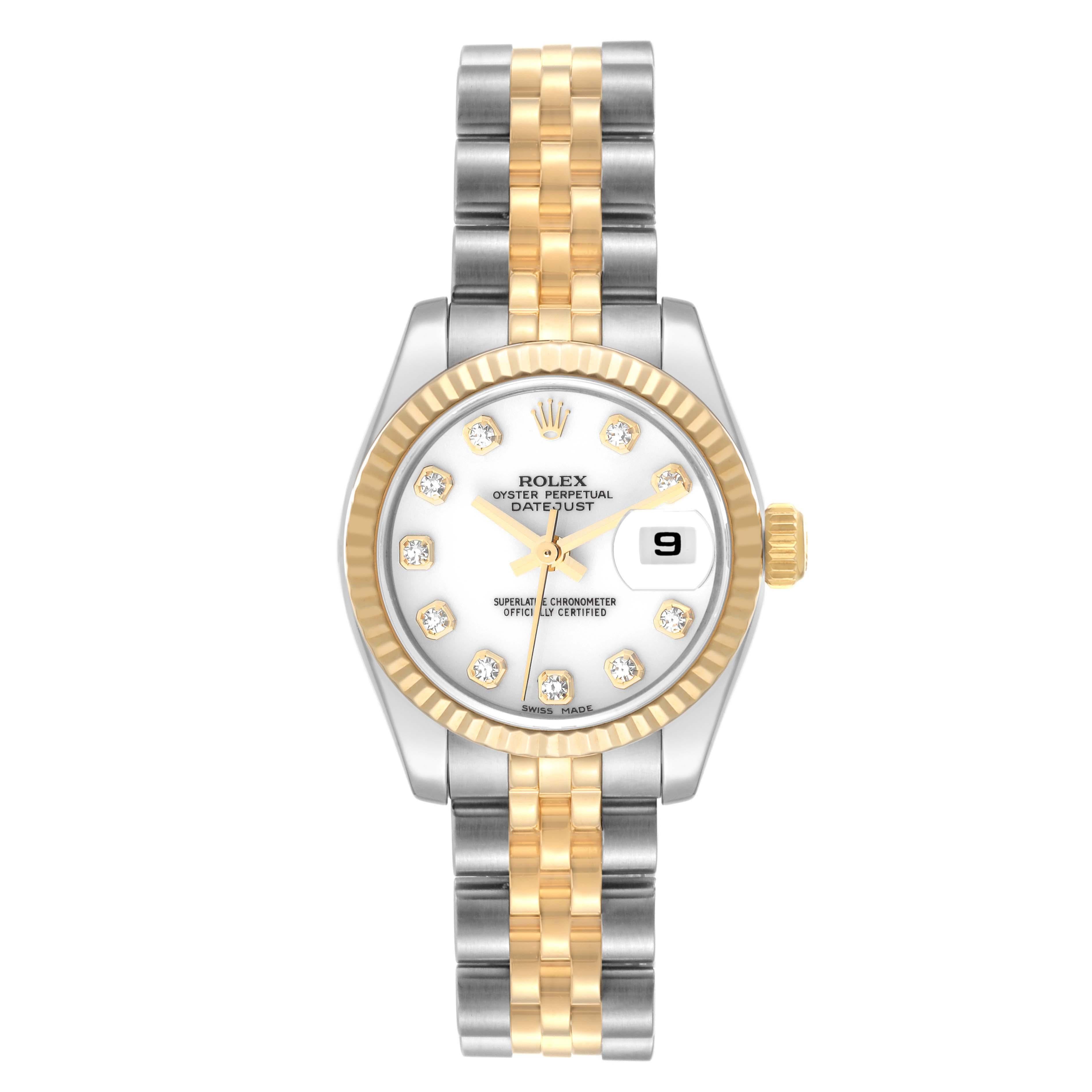Rolex Datejust Steel Yellow Gold White Diamond Dial Ladies Watch 179173. Officially certified chronometer self-winding movement. Stainless steel oyster case 26 mm in diameter. Rolex logo on a 18K yellow gold crown. 18k yellow gold fluted bezel.