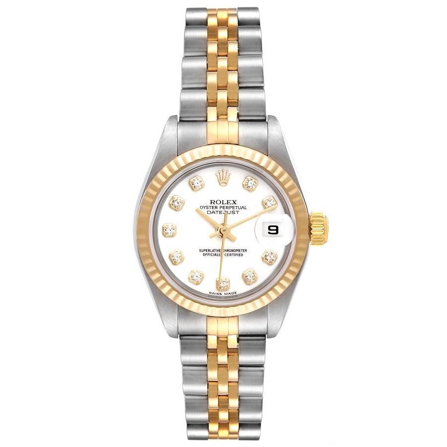 Rolex Datejust Steel Yellow Gold White Diamond Dial Ladies Watch 69173. Officially certified chronometer self-winding movement. Stainless steel oyster case 26.0 mm in diameter. Rolex logo on a crown. 18k yellow gold fluted bezel. Scratch resistant