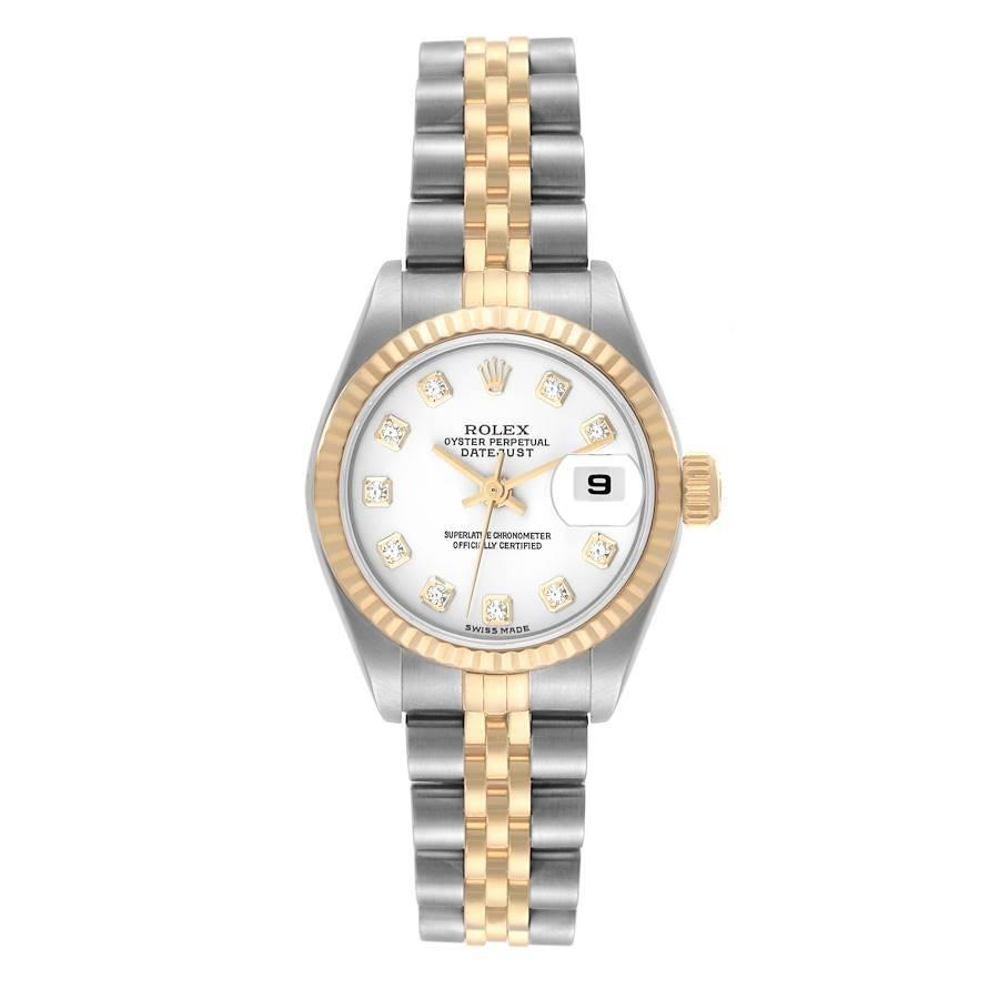 Rolex Datejust Steel Yellow Gold White Diamond Dial Ladies Watch 79173. Officially certified chronometer automatic self-winding movement. Stainless steel oyster case 26.0 mm in diameter. Rolex logo on an 18K yellow gold crown. 18k yellow gold fluted