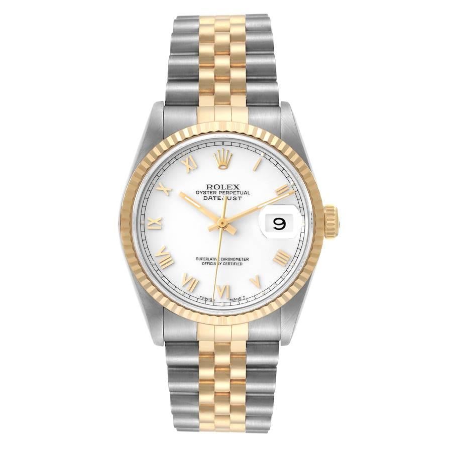 Rolex Datejust Steel Yellow Gold White Roman Dial Mens Watch 16233 Box Papers. Officially certified chronometer automatic self-winding movement. Stainless steel case 36 mm in diameter.  Rolex logo on an 18K yellow gold crown. 18k yellow gold fluted