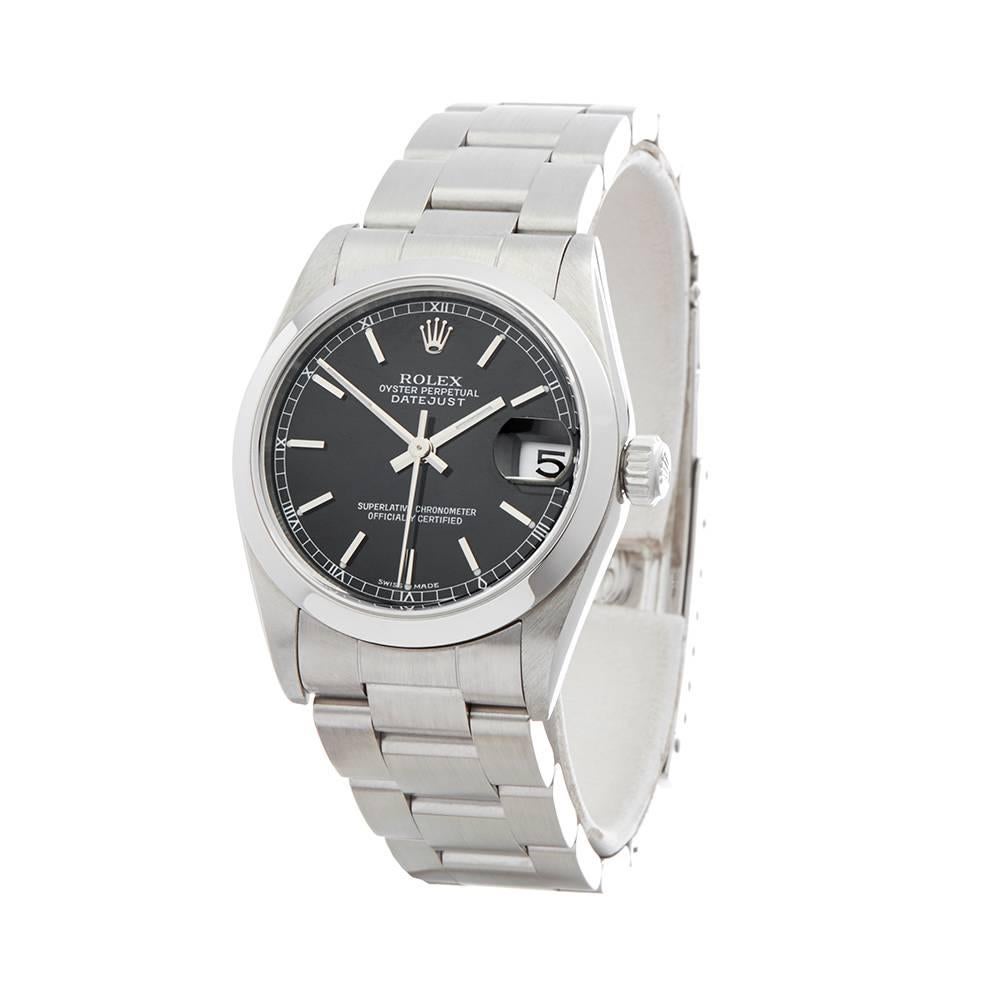 REF: W4467
MANUFACTURE: Rolex
MODEL: Datejust
MODEL REF: 78240
AGE: 7th December 1999 
GENDER: Women's
BOX & PAPERS: Box & Guarantee
DIAL: Black Baton
GLASS: Sapphire Crystal
MOVEMENT: Automatic
WATER RESISTANCY: To Manufacturers Specifications
CASE