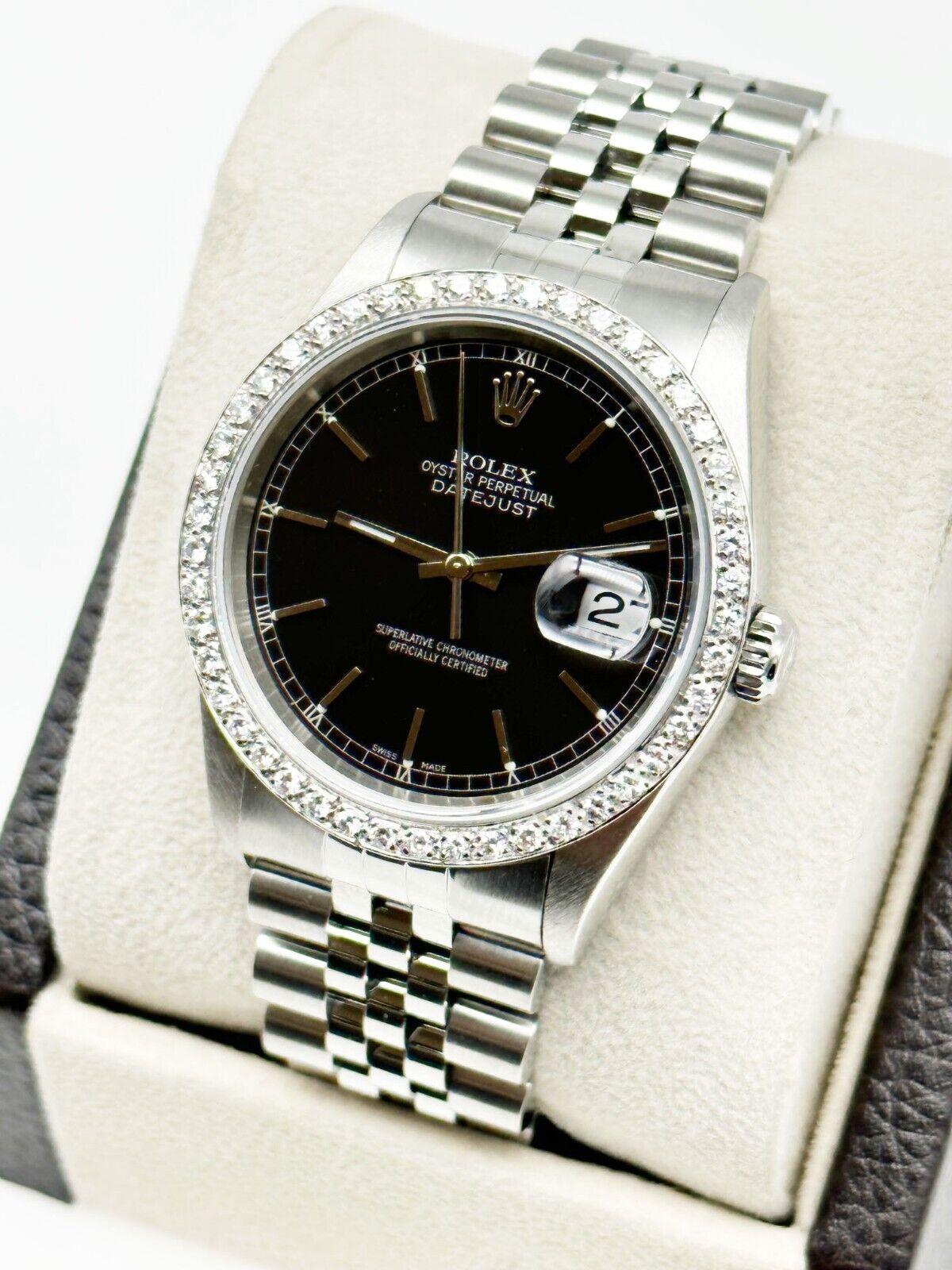 Style Number: 16264 

Serial: K962***

Year: 2001 

Model: Datejust  

Case Material: Stainless Steel  

Band: Stainless Steel  

Bezel: Custom Diamond Bezel  

Dial: Black 

Face: Sapphire Crystal 

Case Size: 36mm 

Includes: 

-Elegant Watch
