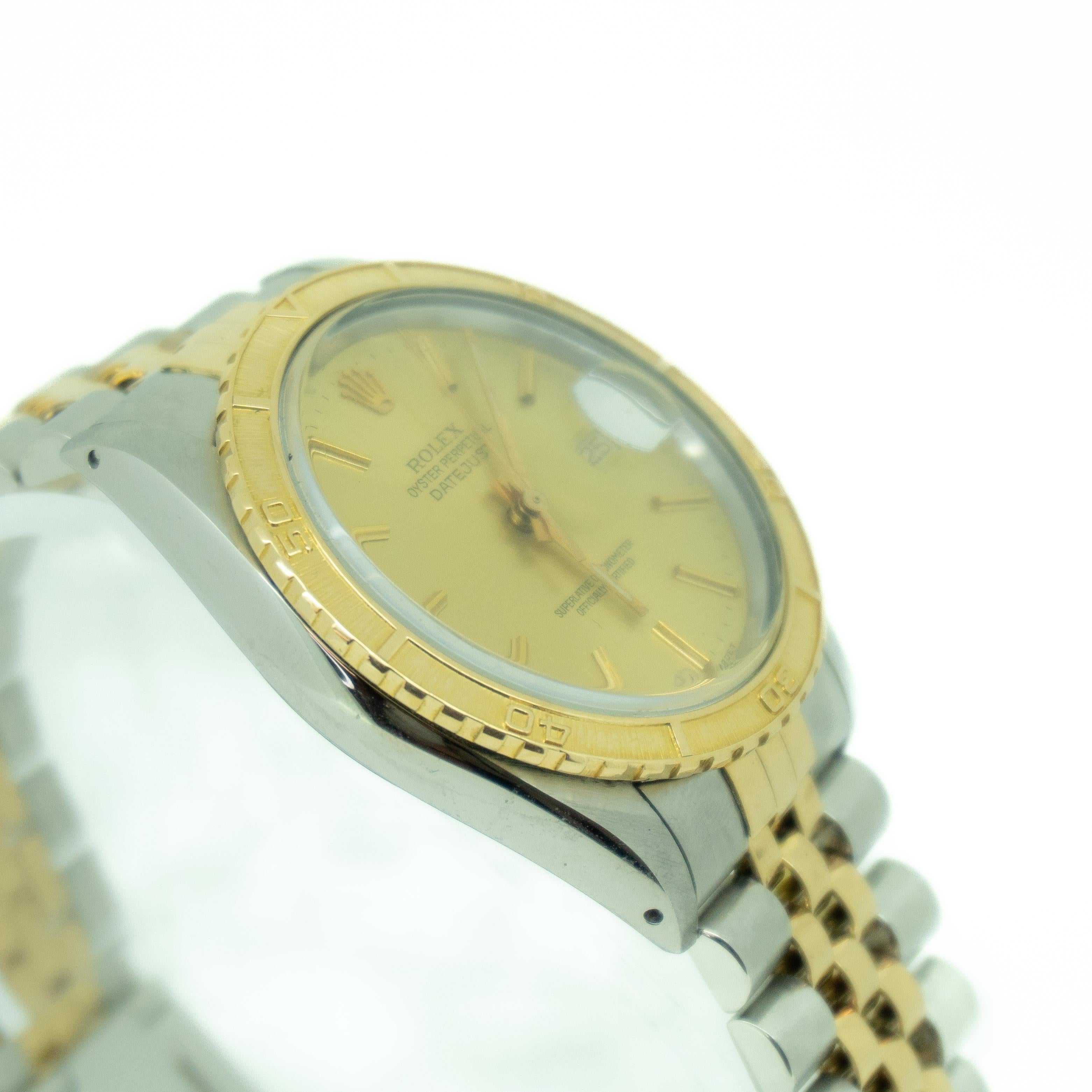 Rolex 16253 Datejust Turn-O-Graph, stainless steel case on an integrated two-tone stainless steel and yellow gold jubilee bracelet with a folding deployant clasp, 18K yellow gold bi-directional rotating bezel, automatic movement, champagne dial with