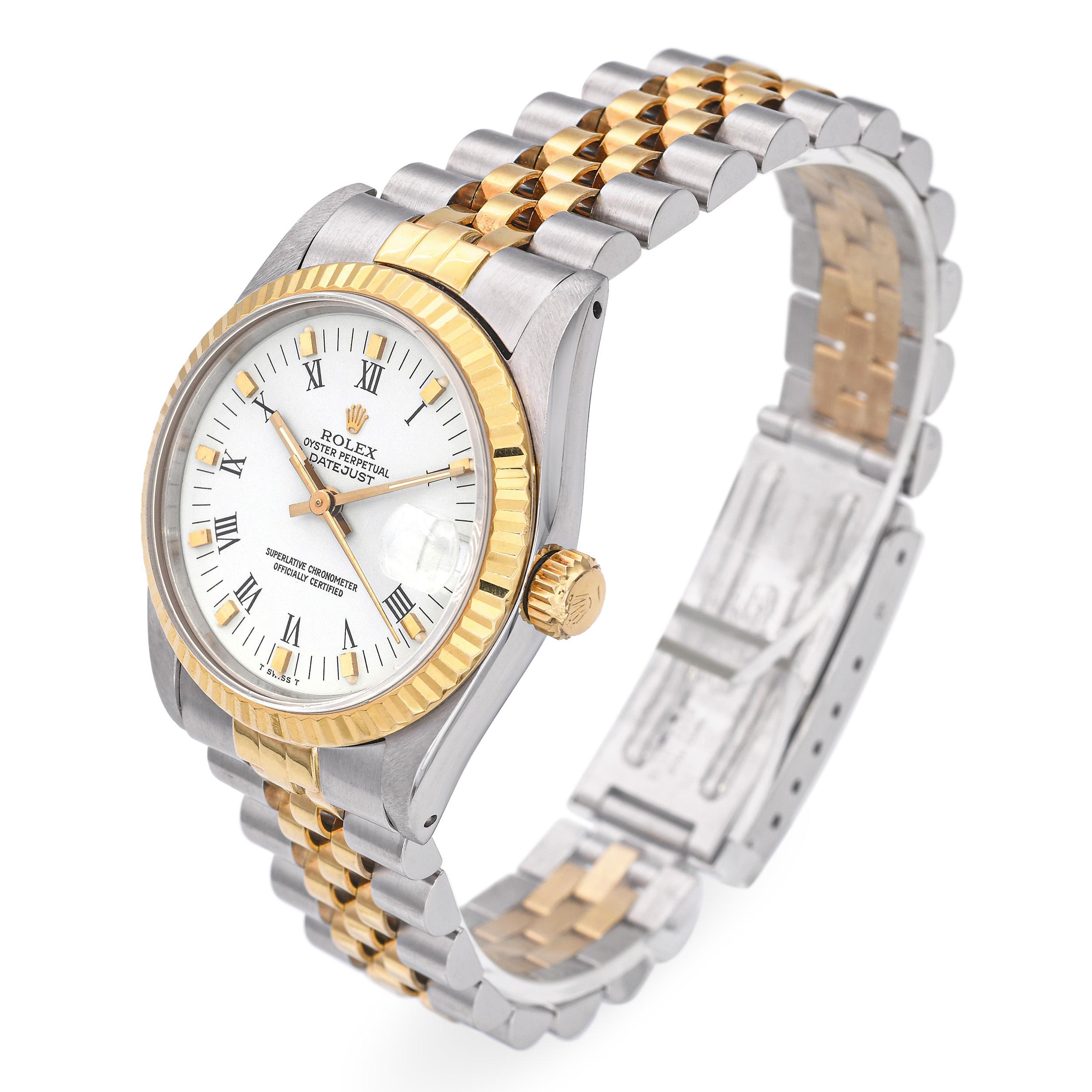 This vintage Rolex Datejust Ref. 68273, crafted in stainless steel and 18k yellow gold, offers a timeless two-tone design. The 31mm case provides a versatile mid-size fit, making it suitable for both men and women. It features the iconic fluted